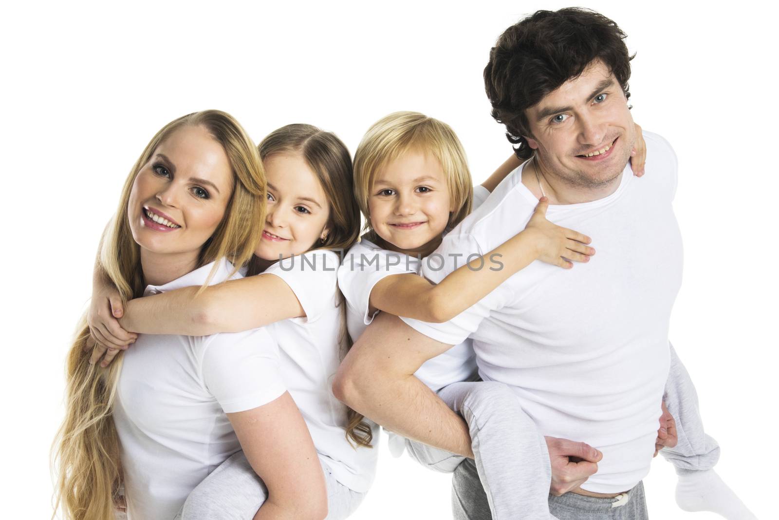 Parents giving children piggy back ride studio isolated on white background