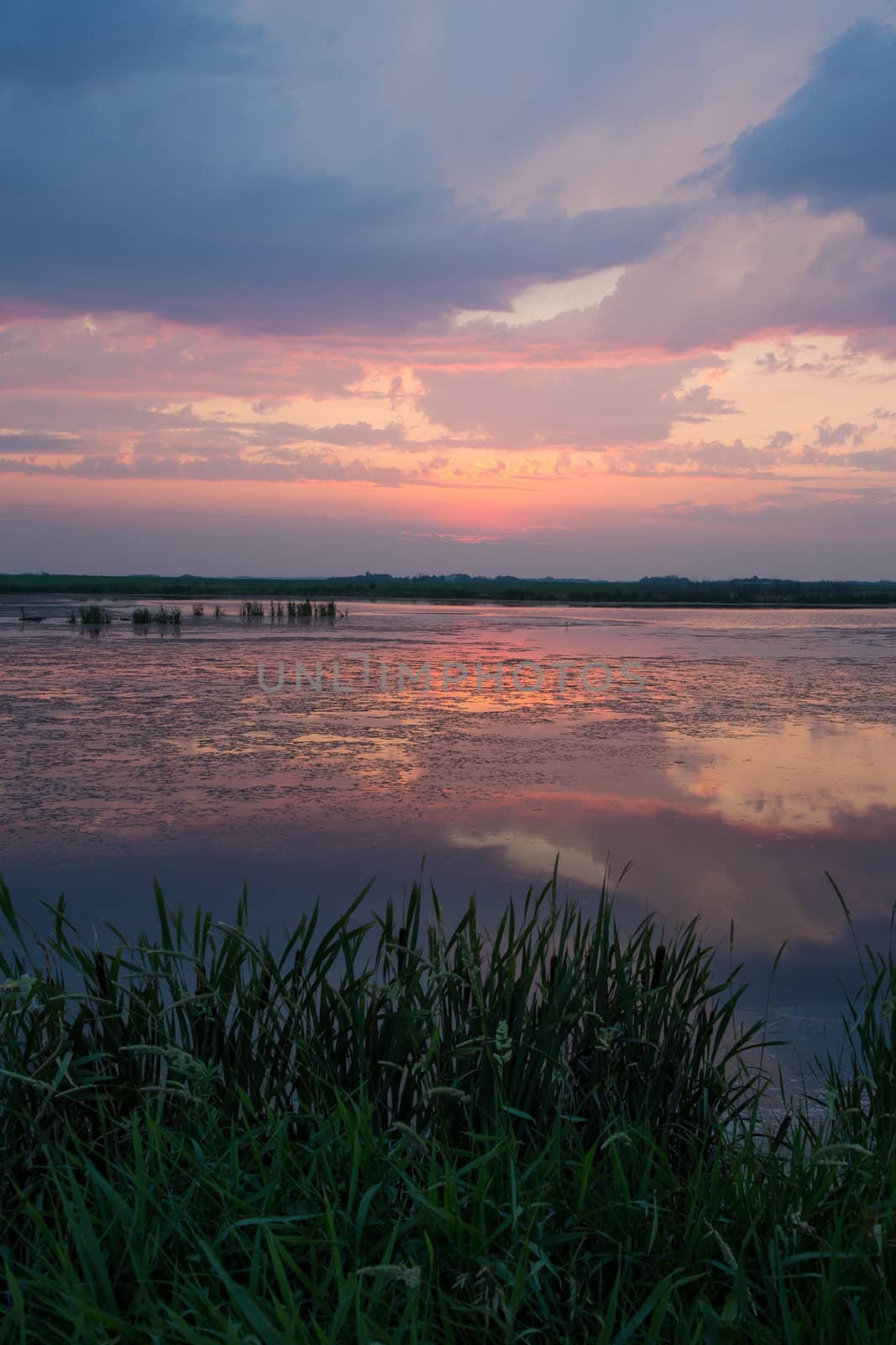 Sunset Reflection on a Small Lake by rjamphoto