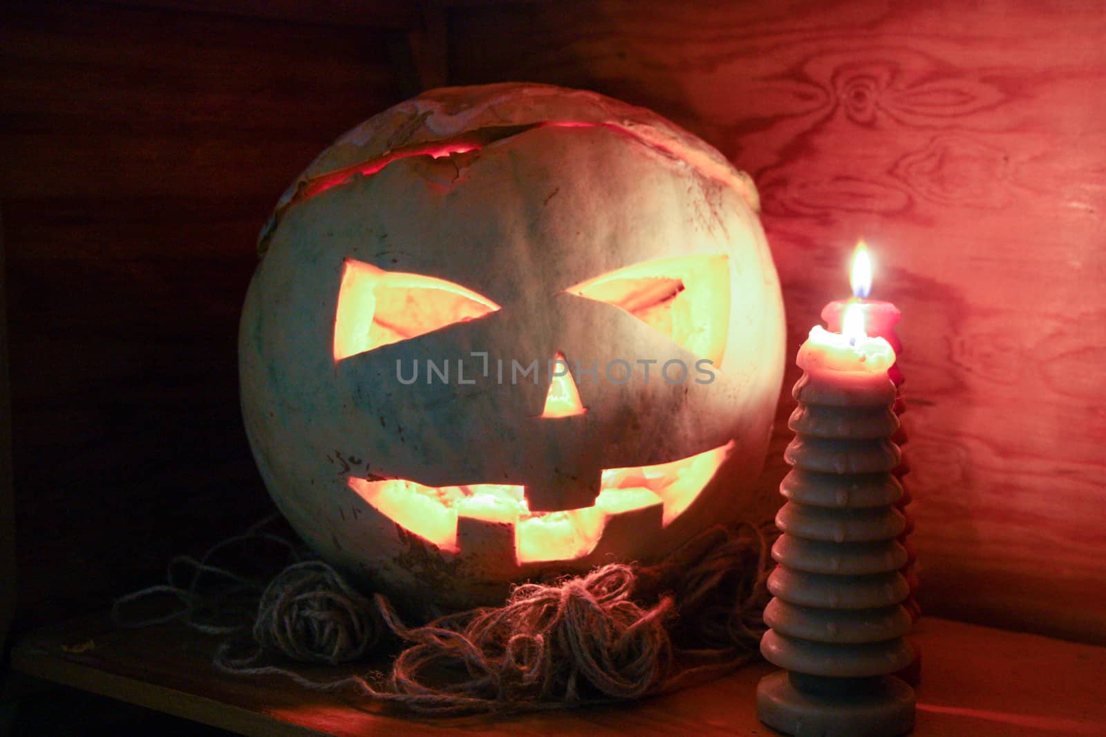 Halloween concept. Fiery pumpkin. Scary and scary. Photo horizontal for your design.
