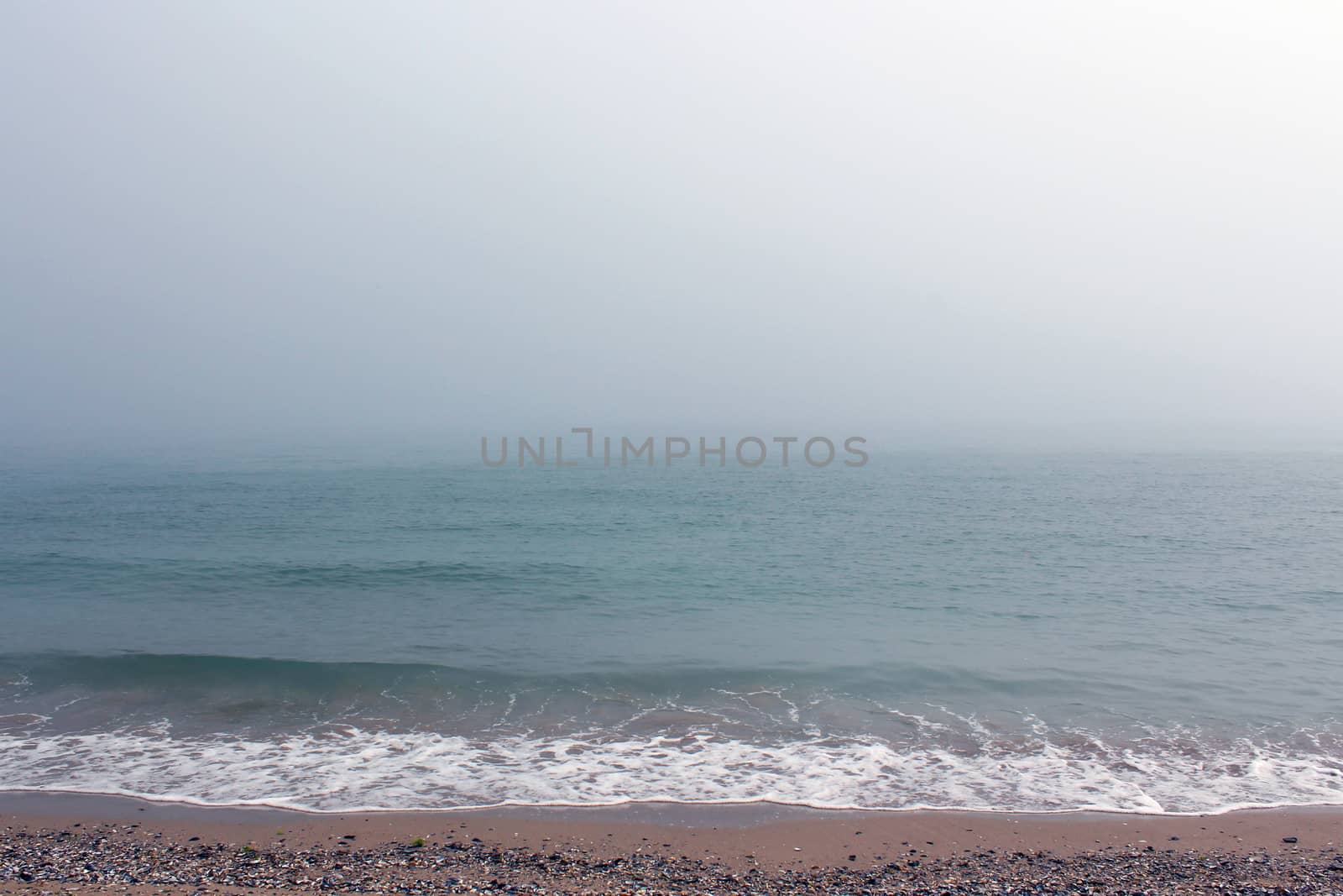 Sea shore in a foggy day