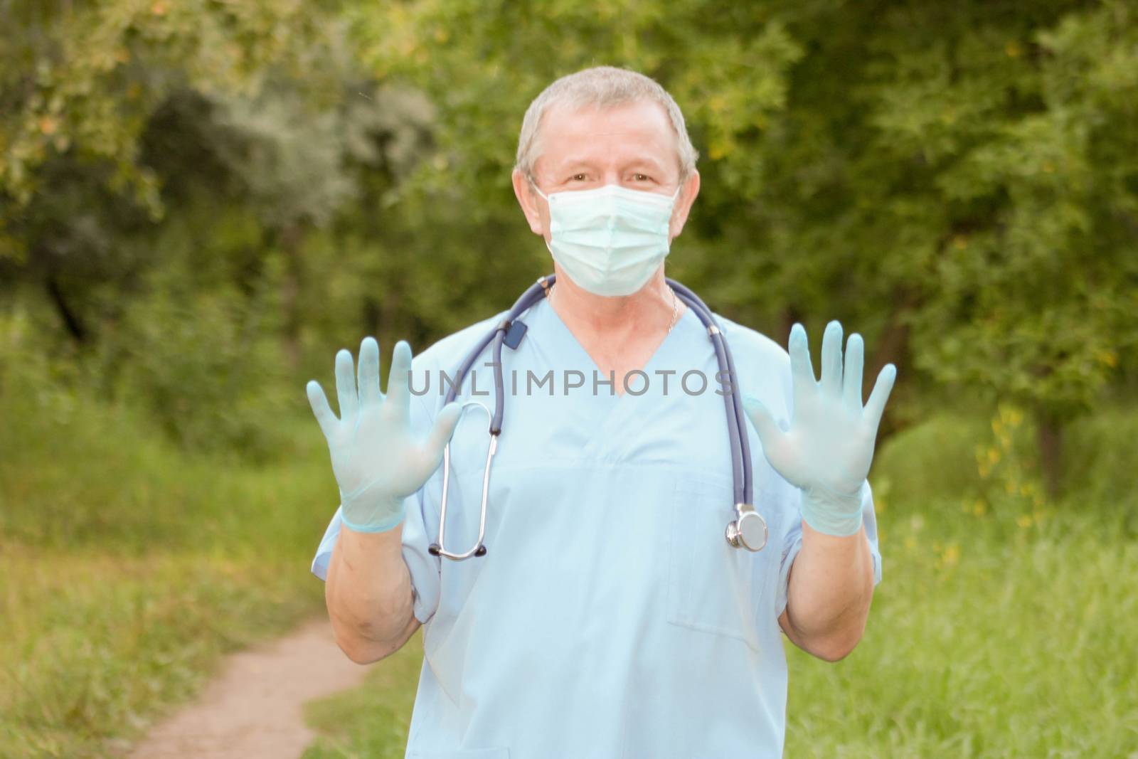Doctor concept treatment nature. a responsibility. The doctor is holding his hands up. Photo horizontal for your design.