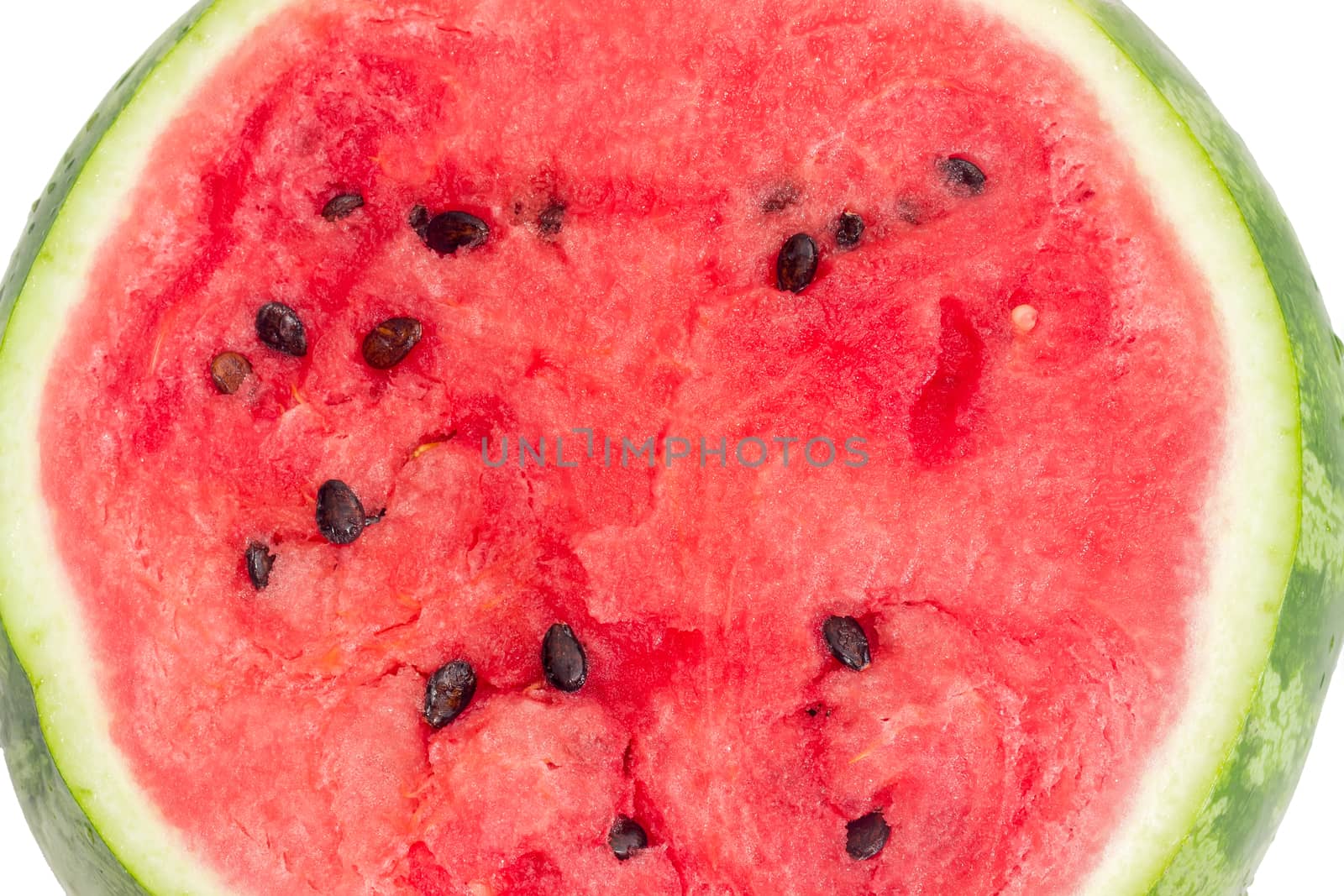 Background of a cut of the watermelon with deep red flesh and seeds on a white background
