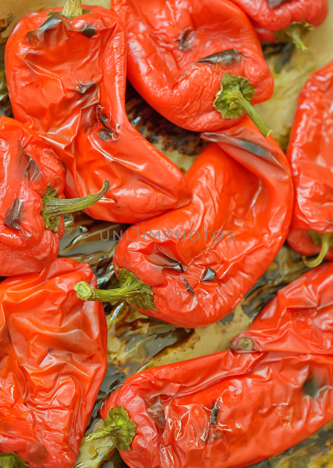 Red bell paprika roasting in the oven 