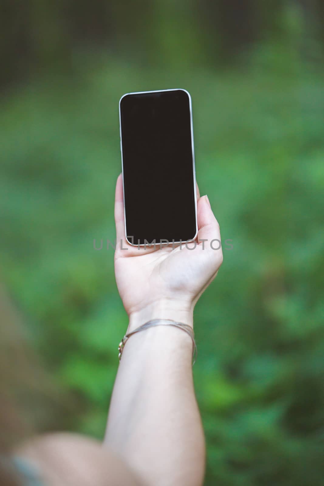 Close up of smart phone in girl's hand