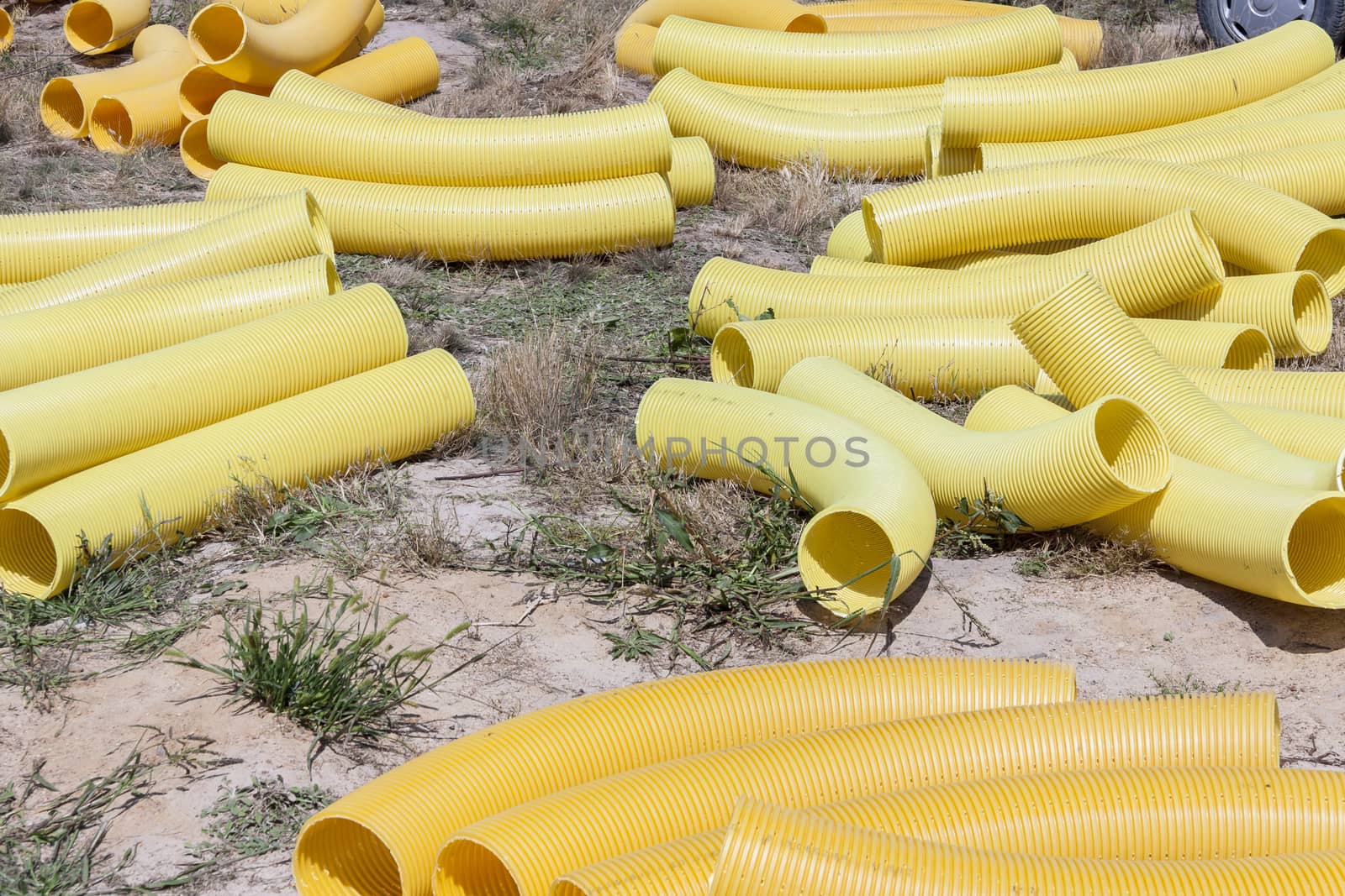 Yellow drain pipe - construction site.