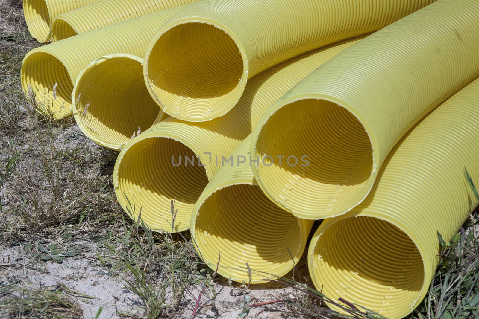 Yellow drain pipe - construction site.