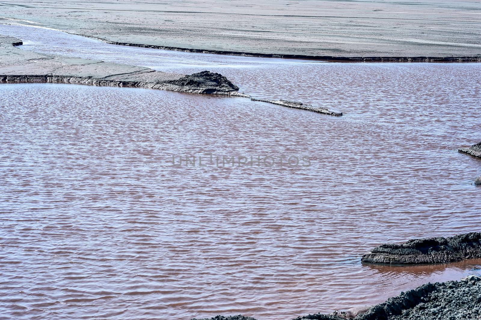 Production waste is accumulated in water.