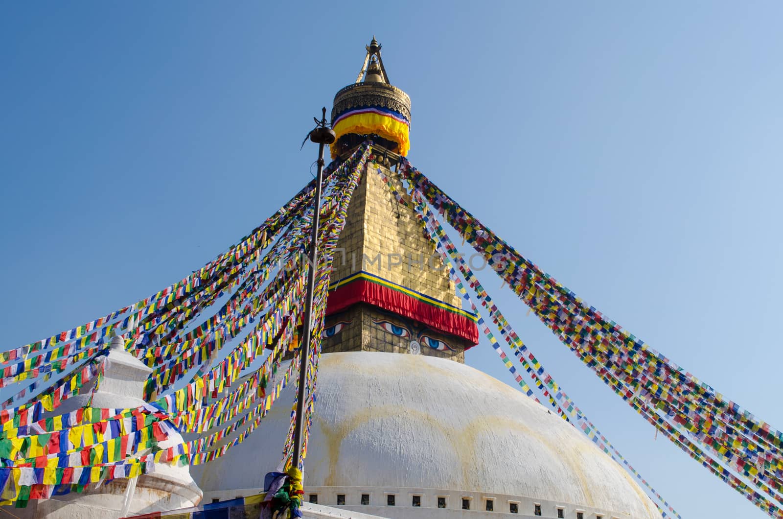 the famous buuha eye gazing out sleepily from each side of the tower are those of the all seeing primordial buddha.perched a top a hill on the western edge of the kathmandu valley.
