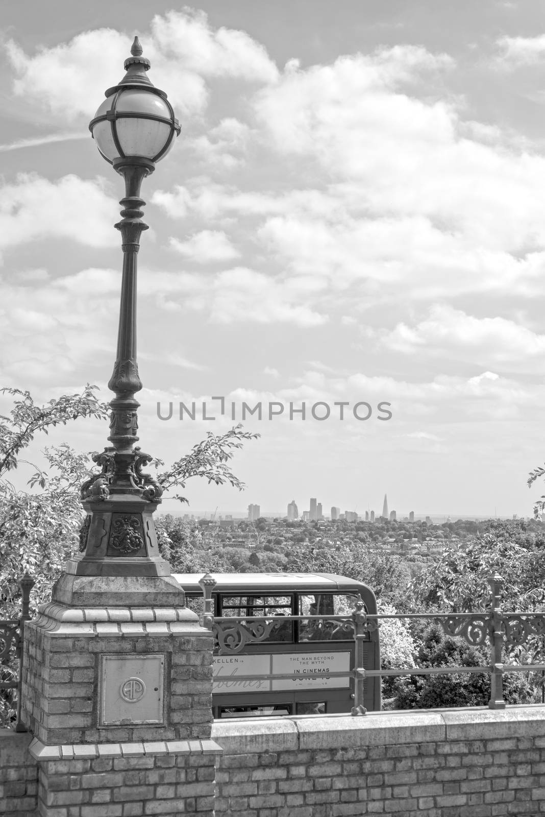 antique street light with a beautiful view of london city