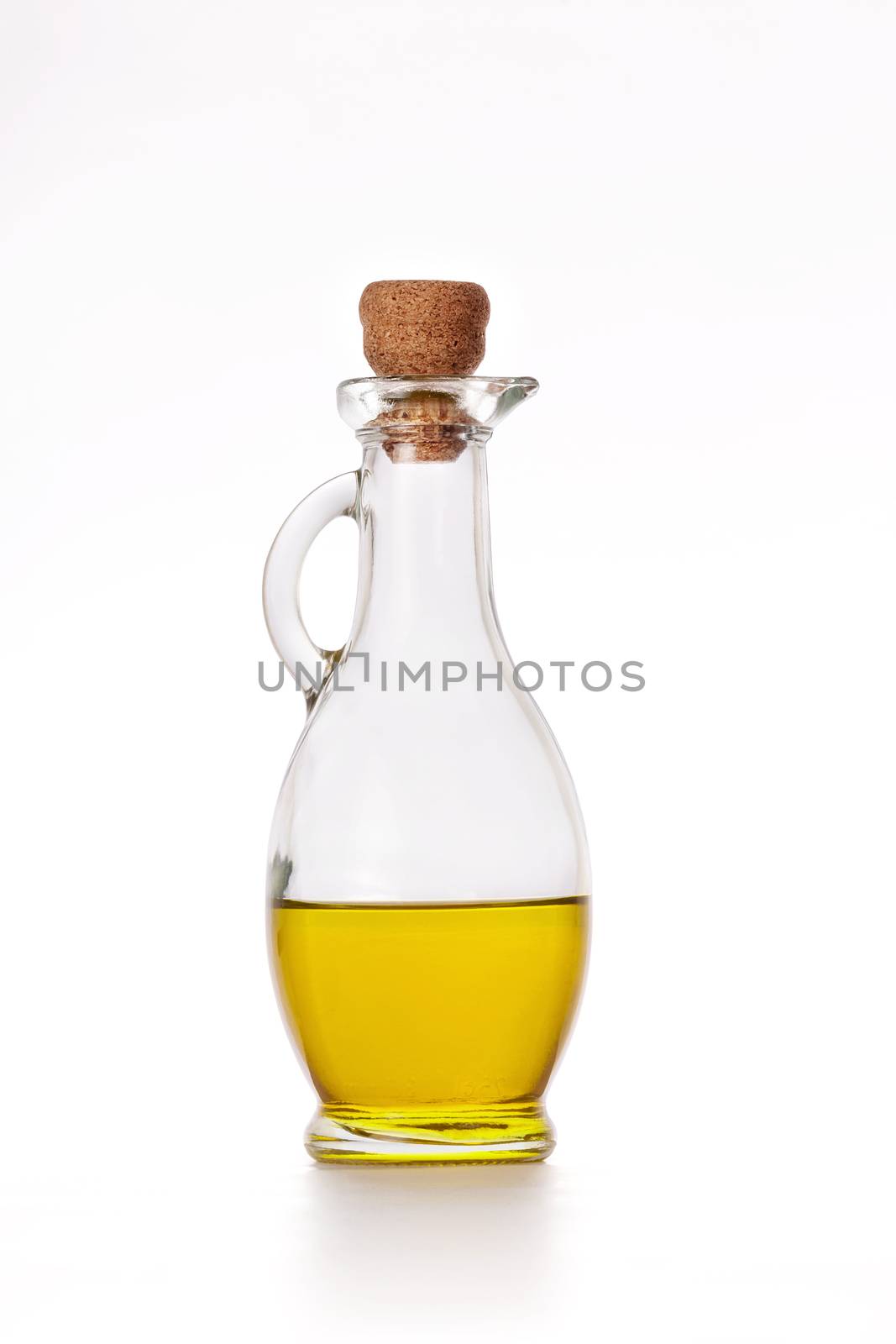 Olive oil in a bottle isolated on white background