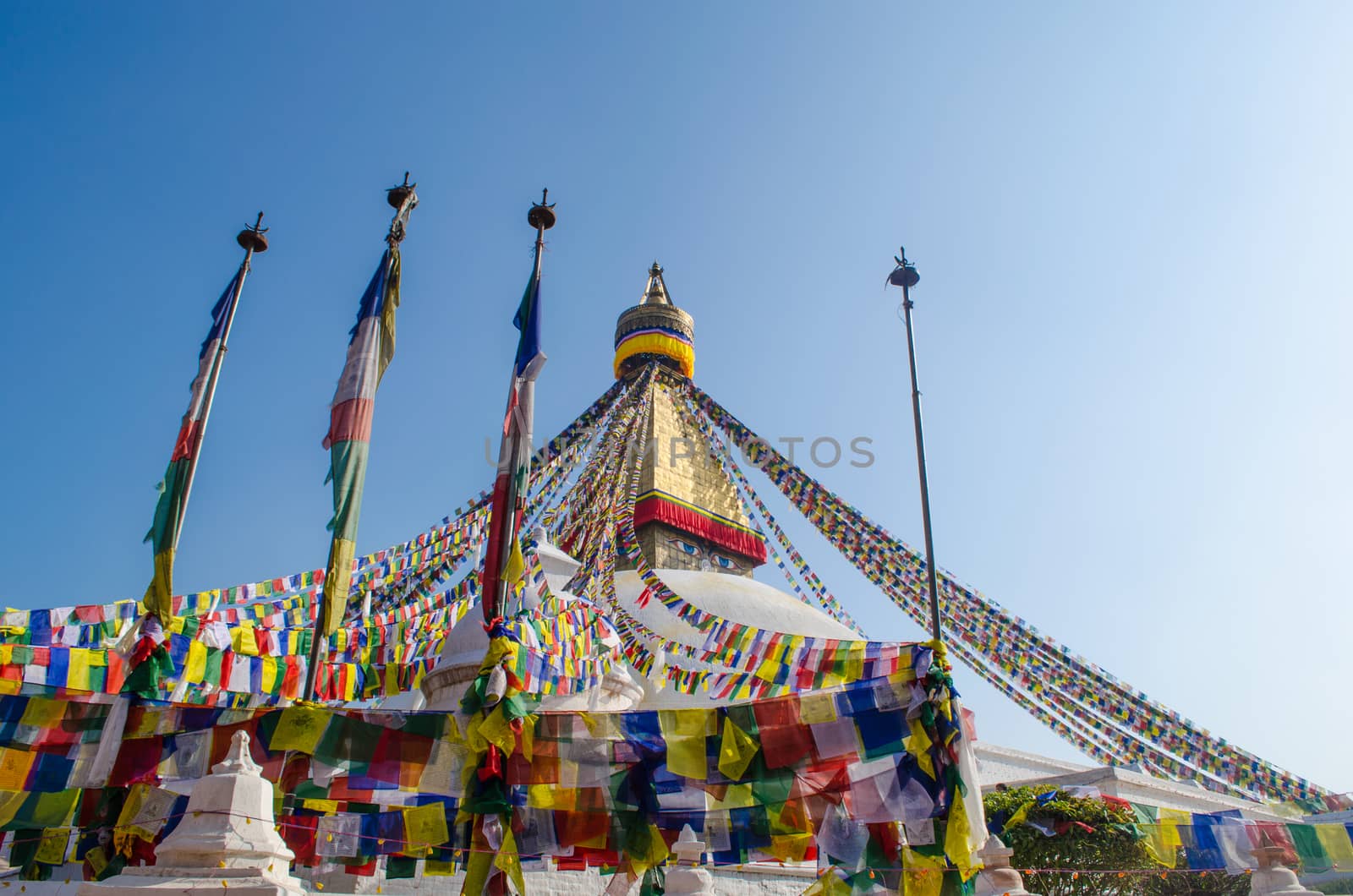 the famous buuha eye gazing out sleepily from each side of the tower are those of the all seeing primordial buddha.perched a top a hill on the western edge of the kathmandu valley.