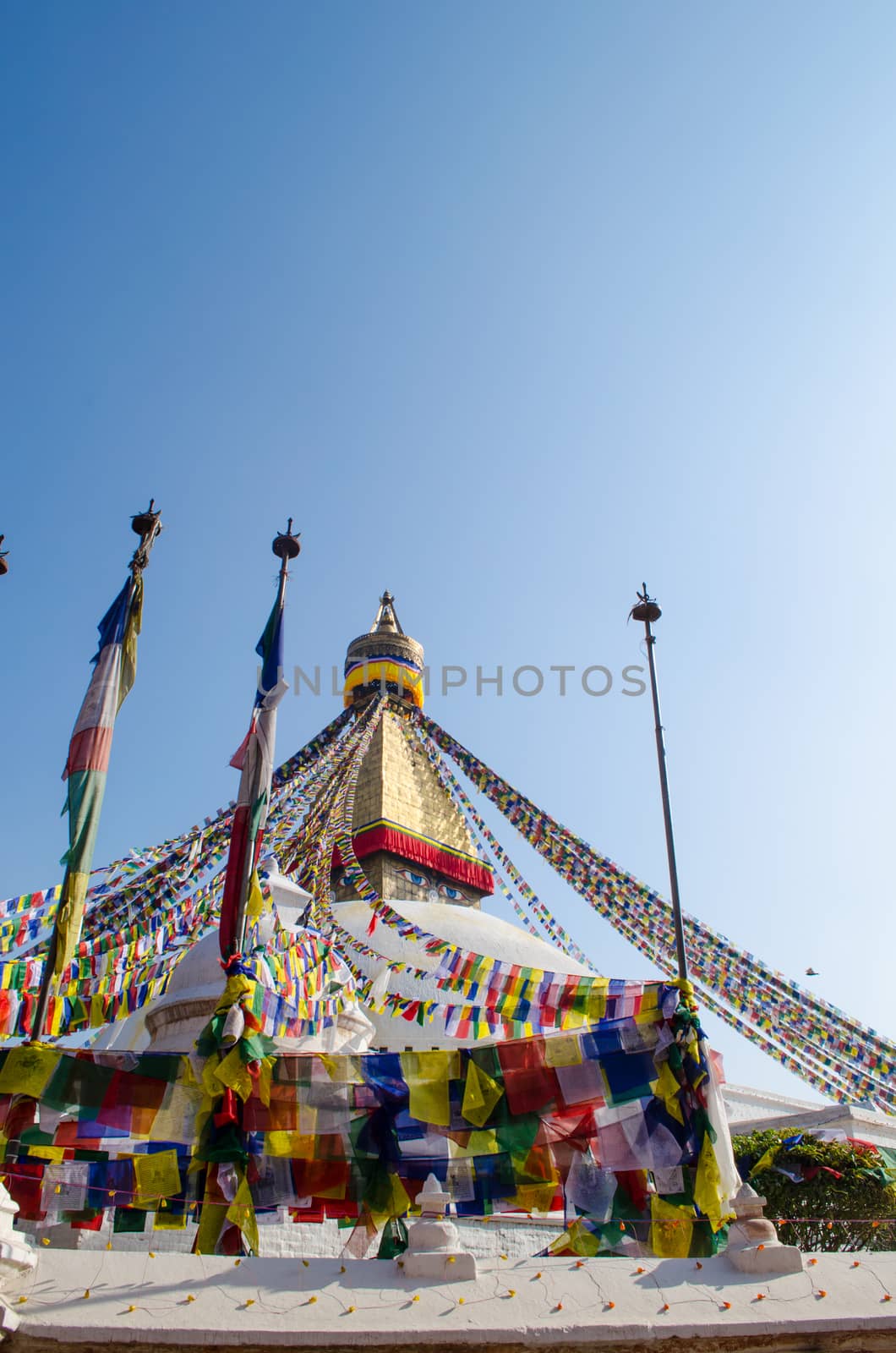 the famous buuha eye gazing out sleepily from each side of the tower are those of the all seeing primordial buddha.perched a top a hill on the western edge of the kathmandu valley.