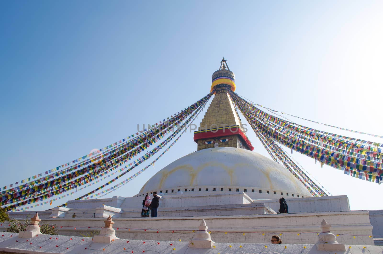 the famous buuha eye gazing out sleepily from each side of the tower are those of the all seeing primordial buddha.perched a top a hill on the western edge of the kathmandu valley.