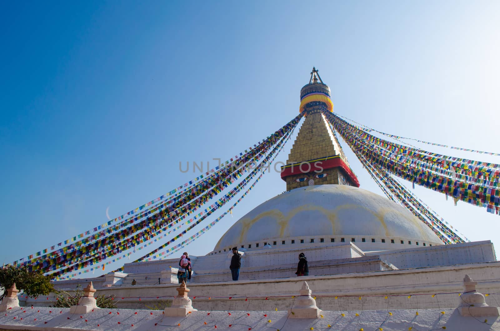 the famous buuha eye gazing out sleepily from each side of the tower are those of the all seeing primordial buddha.perched a top a hill on the western edge of the kathmandu valley.
