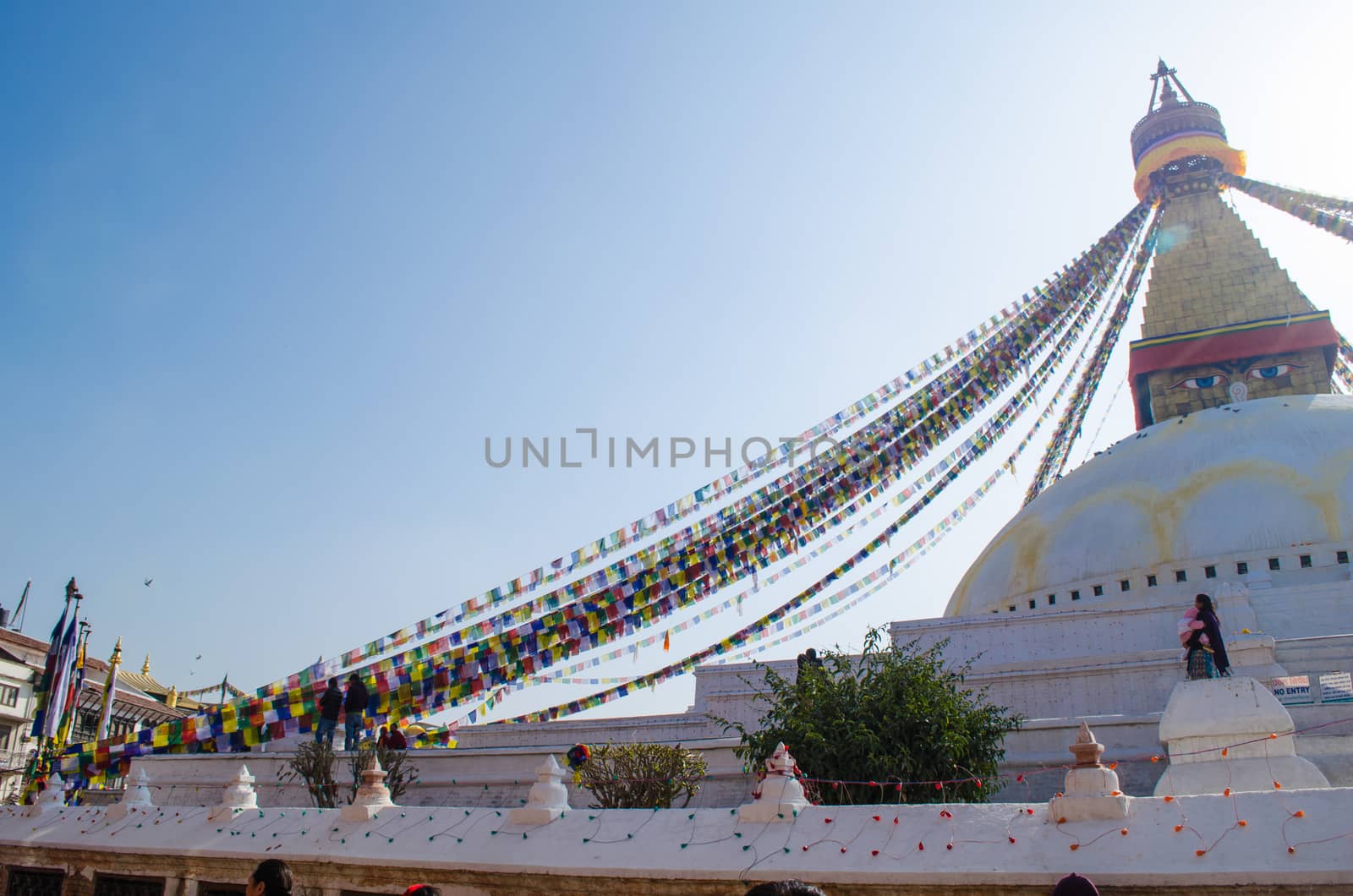 the famous buuha eye gazing out sleepily from each side of the tower are those of the all seeing primordial buddha.perched a top a hill on the western edge of the kathmandu valley.