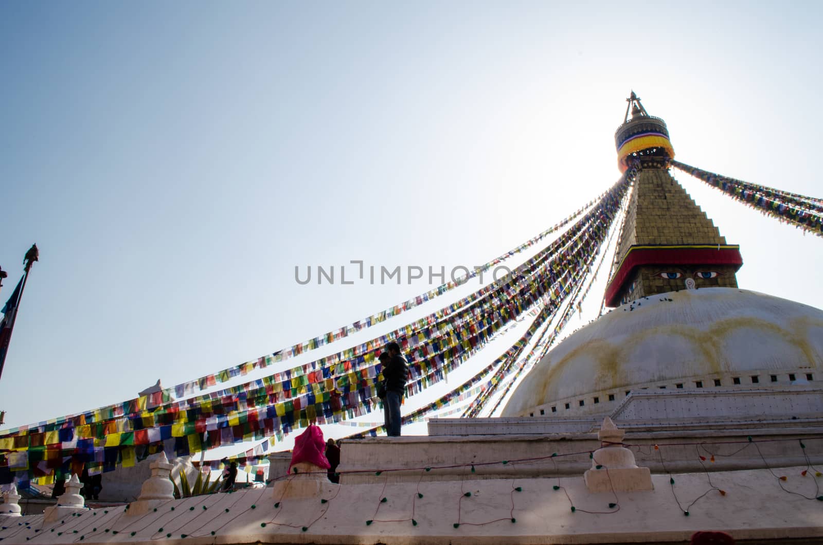 the famous buuha eye gazing out sleepily from each side of the tower are those of the all seeing primordial buddha.perched a top a hill on the western edge of the kathmandu valley.