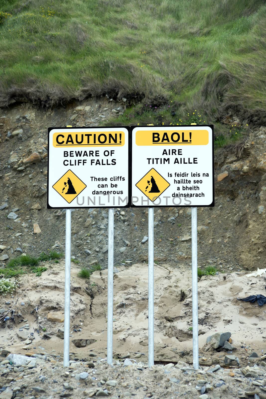 beware of cliff falls signs on ballybunion beach in county kerry ireland
