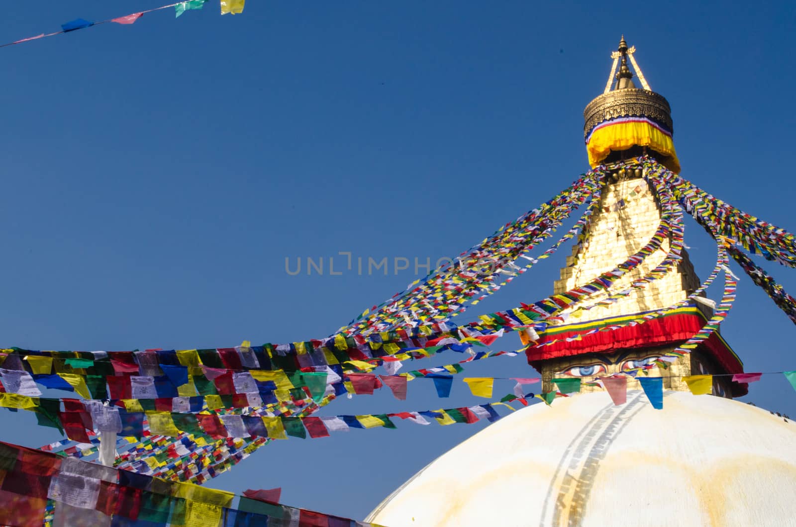 the famous buuha eye gazing out sleepily from each side of the tower are those of the all seeing primordial buddha.perched a top a hill on the western edge of the kathmandu valley.