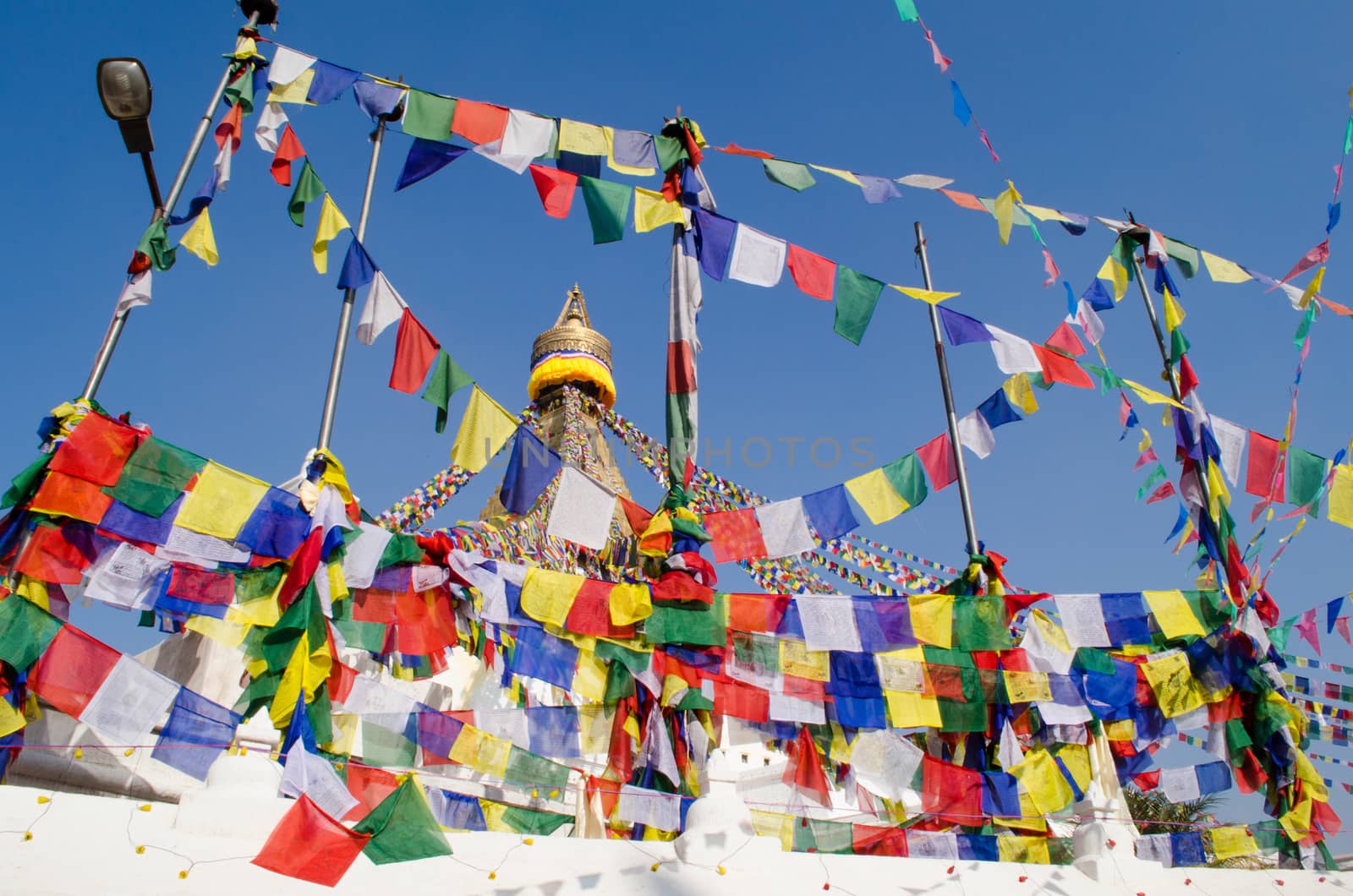 the famous buuha eye gazing out sleepily from each side of the tower are those of the all seeing primordial buddha.perched a top a hill on the western edge of the kathmandu valley.