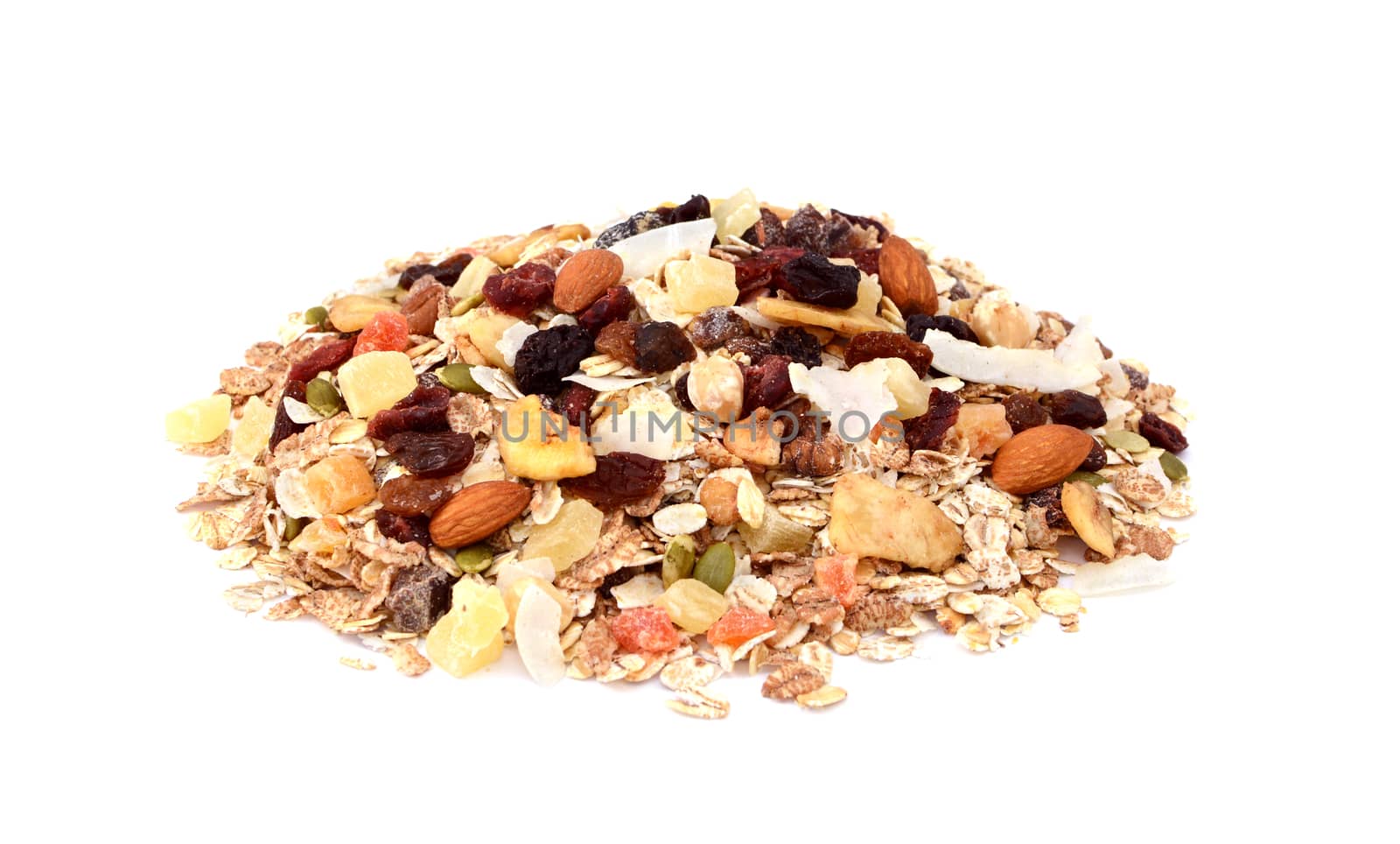 Muesli - mixed fruit and nuts with cereal flakes and seeds, isolated on a white background