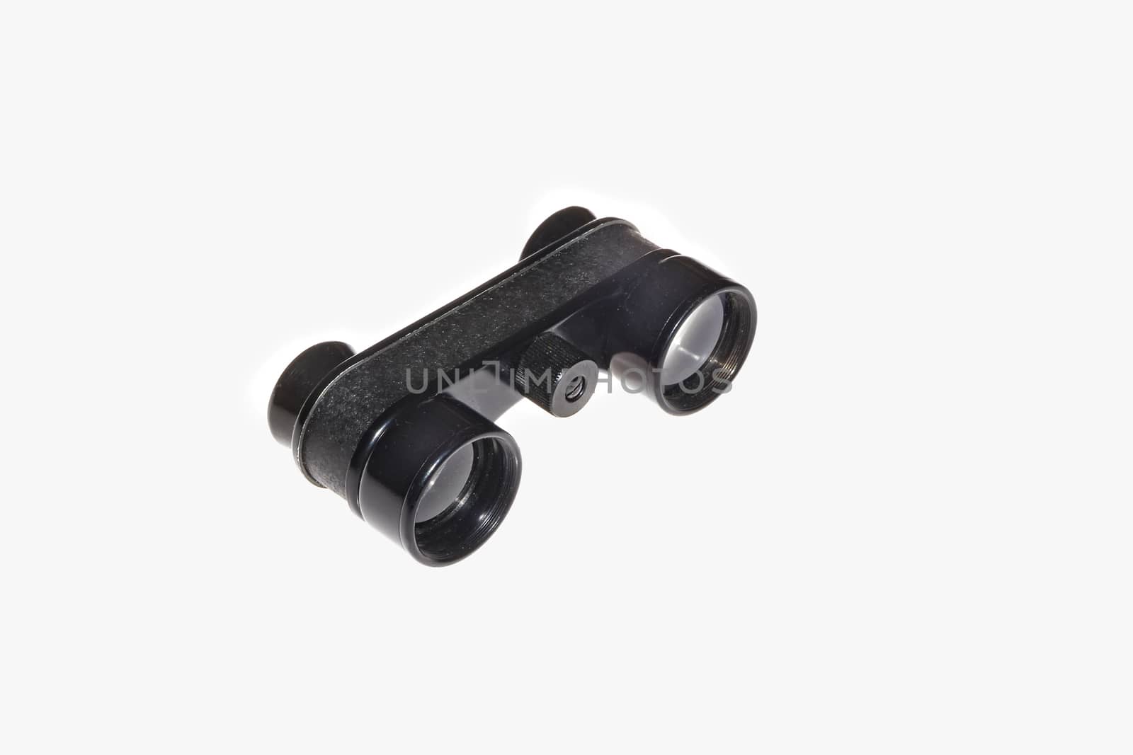 Binoculars isolated on the white background. Sideways view