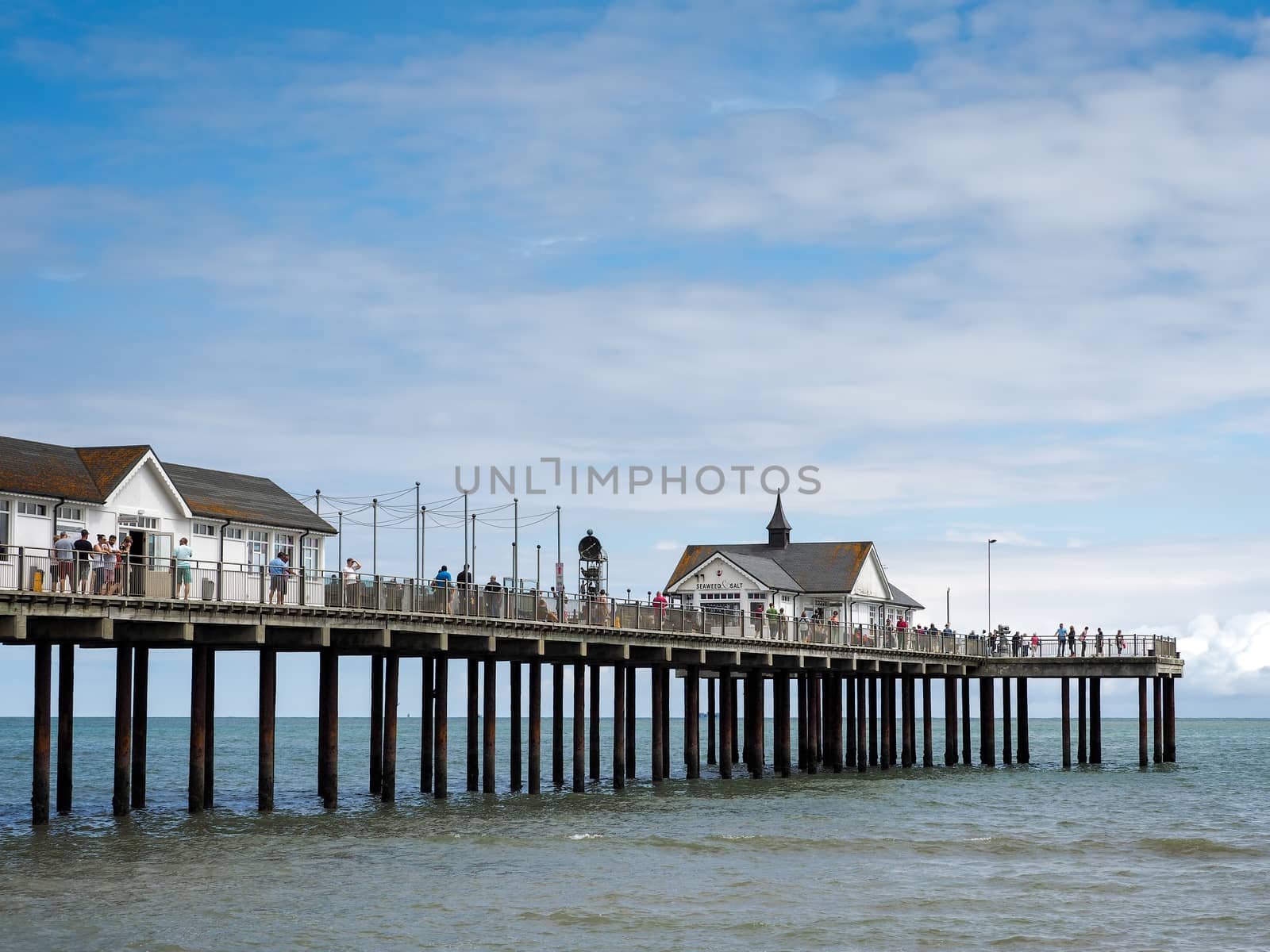 People Enjoying a Sunny Day Out on Southwold Pier