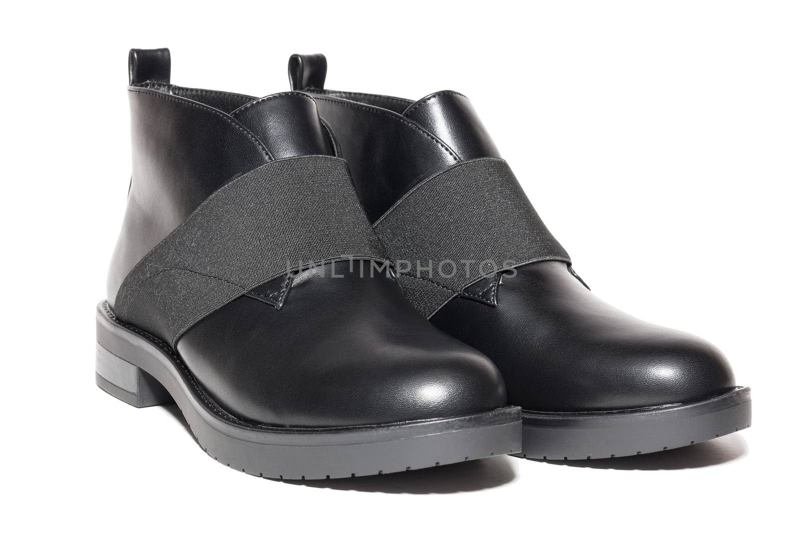 Female winter leather shoes on a white background, isolated, studio
