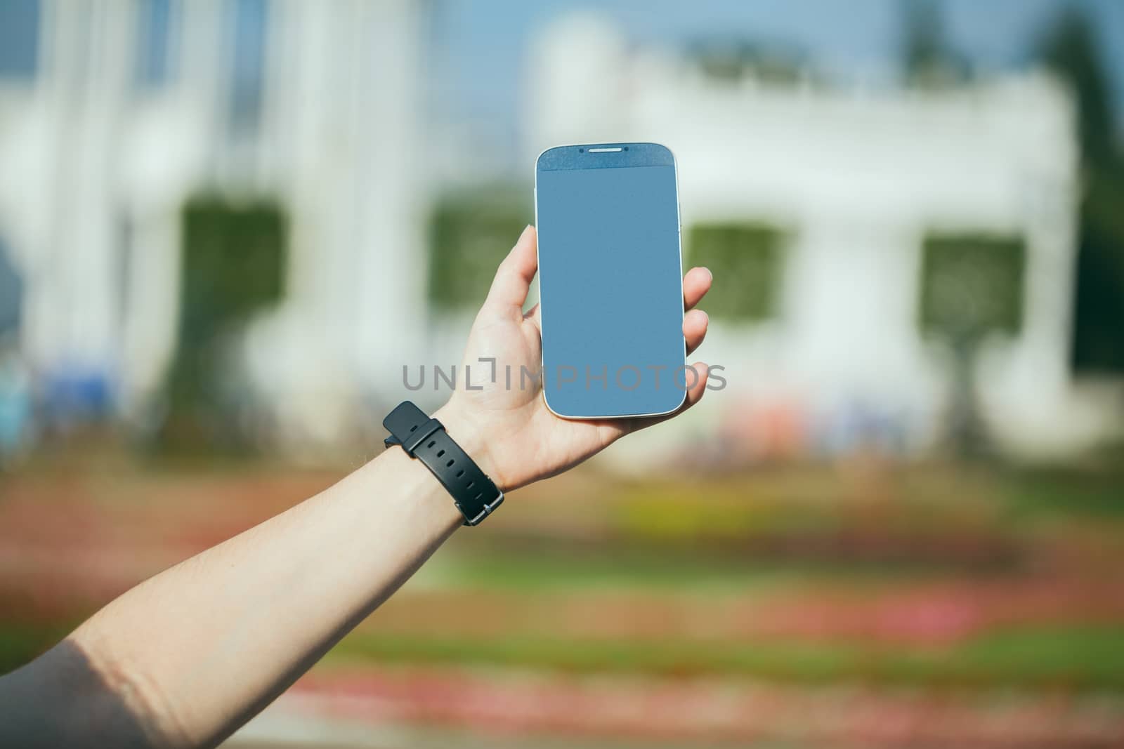 Close up of smart phone in girl's hand