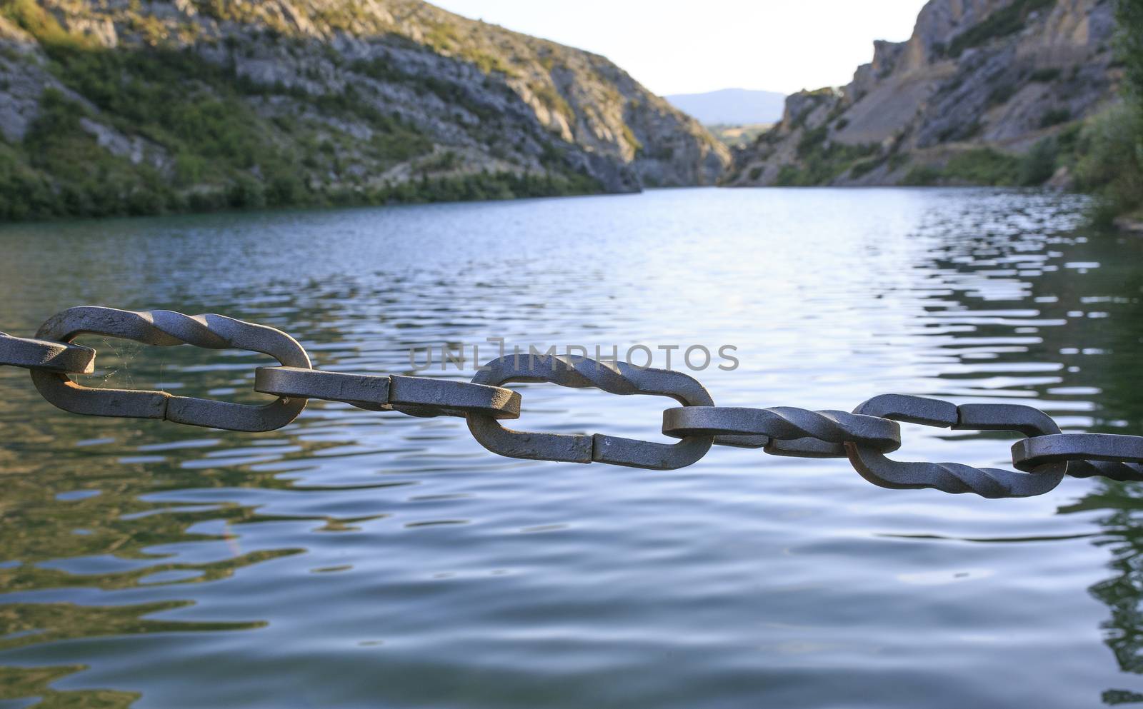 Wooden Bridge chains  in a river of Pirineos