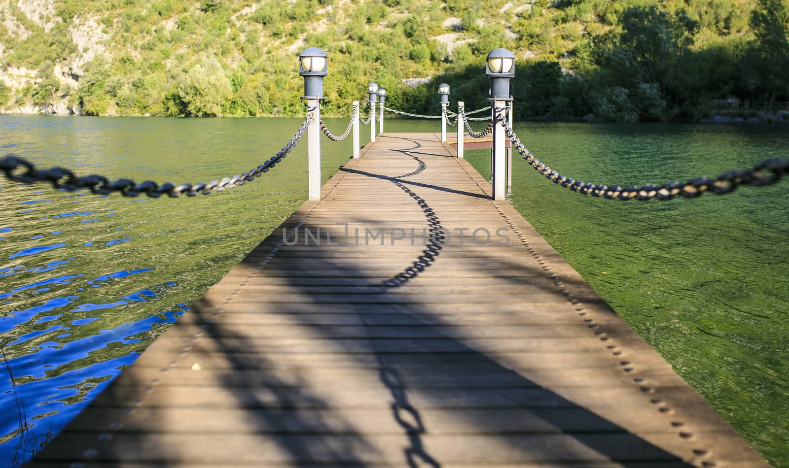 Wooden Bridge  in a river of Pirineos