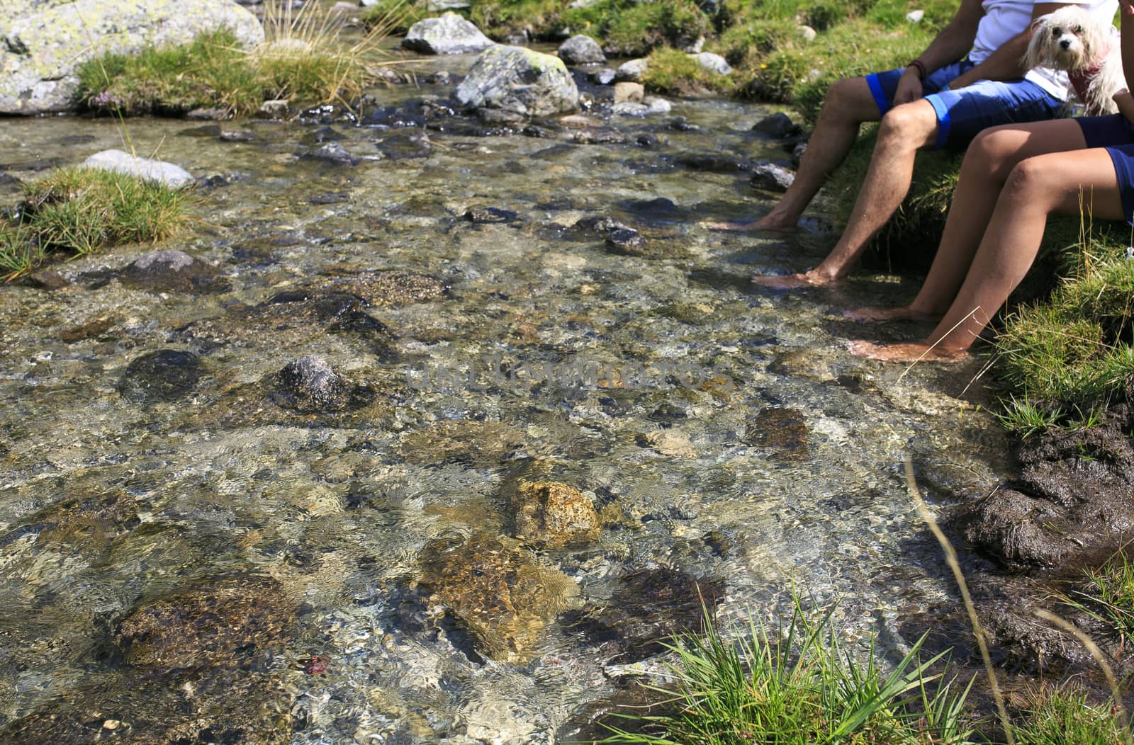 Man with his foots on the water