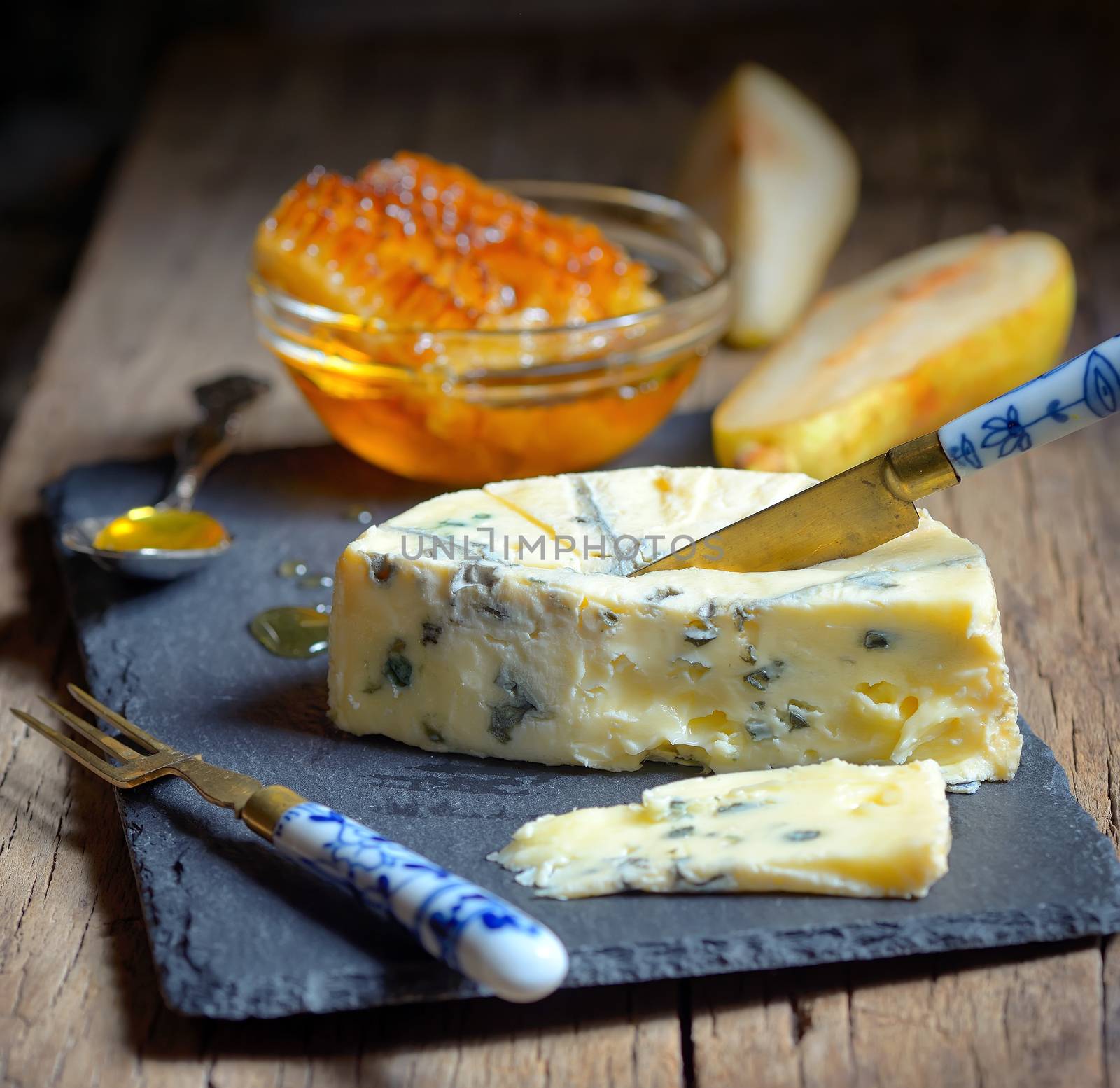 Blue Cheese and honey on ardesia plate