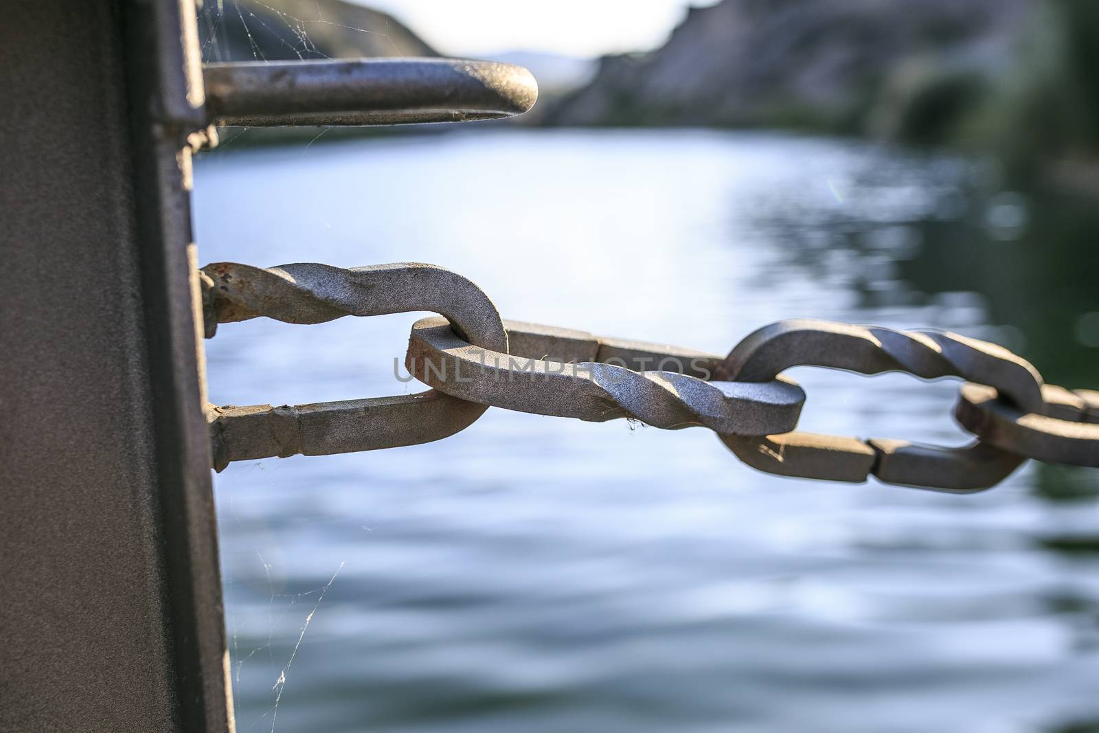 Wooden Bridge chains  in a river of Pirineos