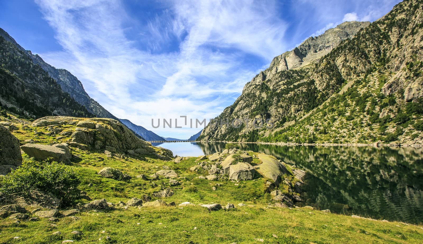 Mountains and lake photo with reflection