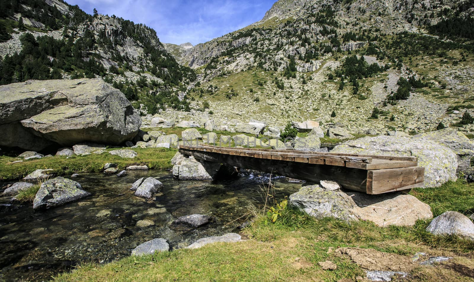 Wooden Bridge  in a river of Pirineos