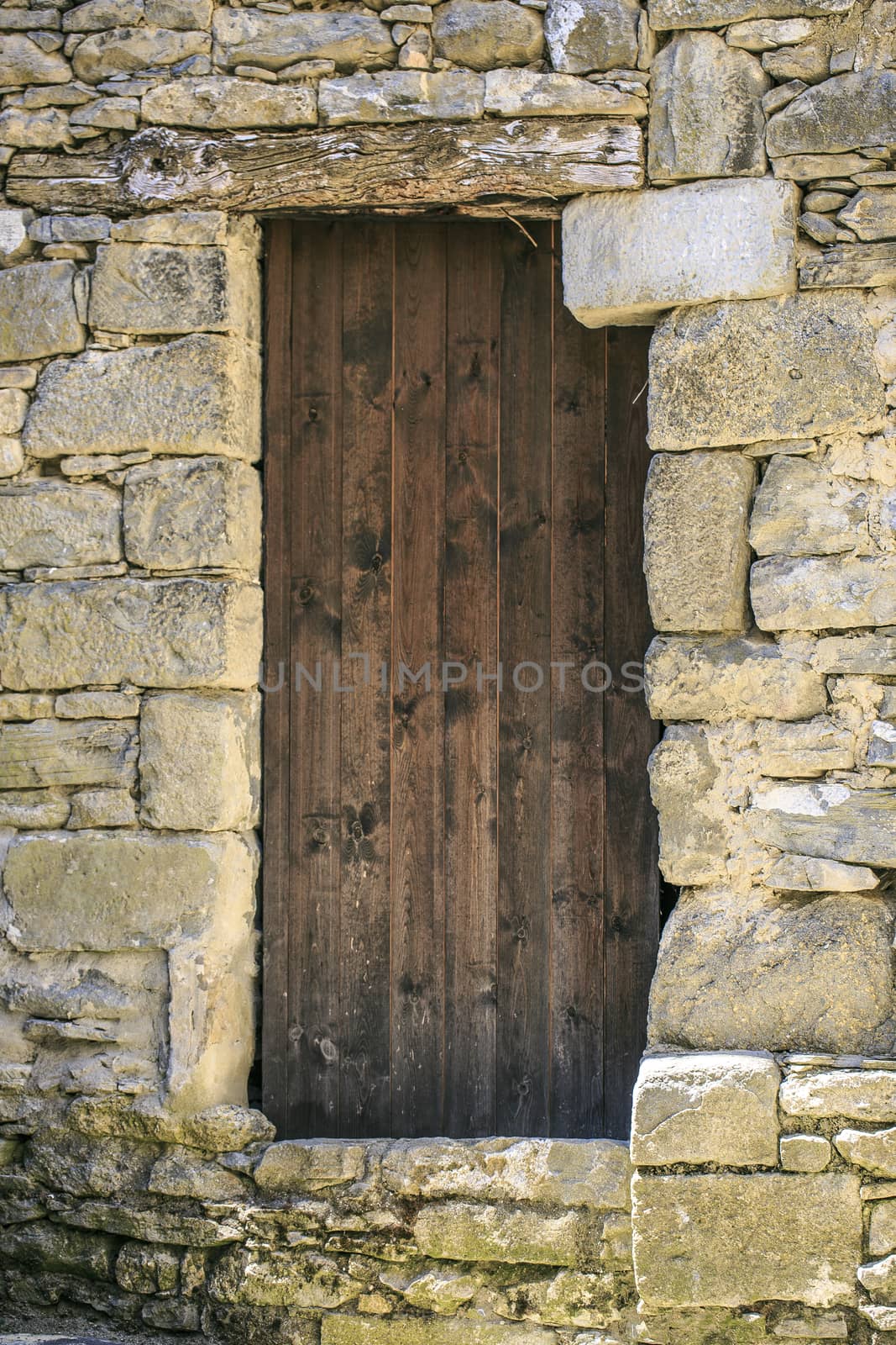 Vintage old wooden door in a Town of spain