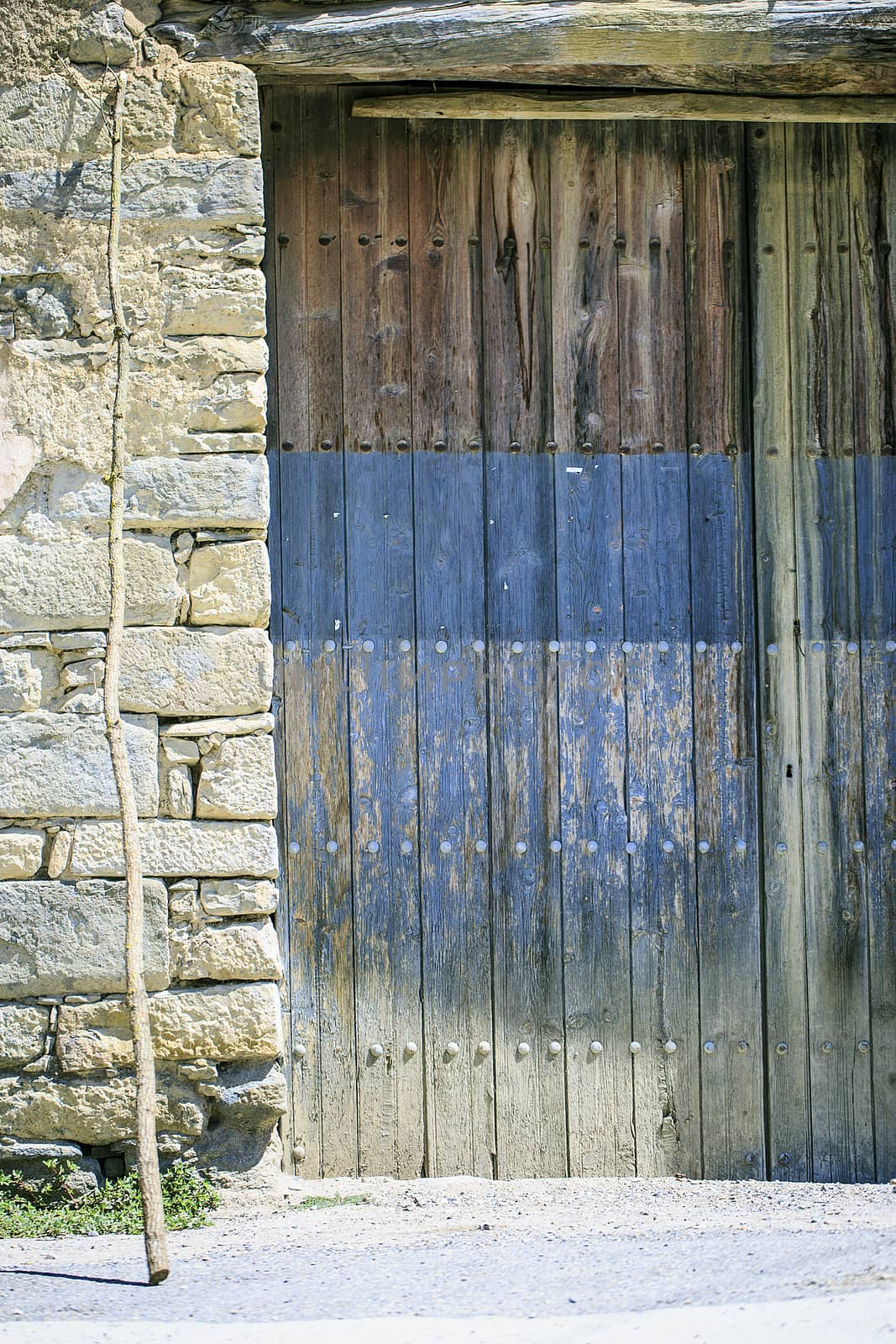 Vintage old wooden door in a Town of spain