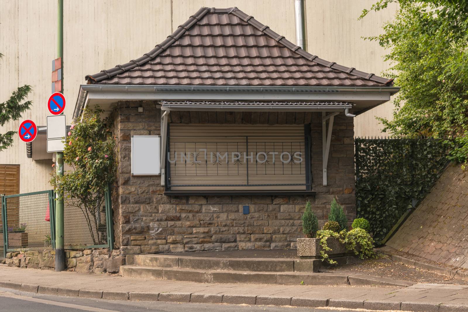 Small typical closed Ruhr area kiosk, in the city of Essen, district Kupferdreh in Germany.