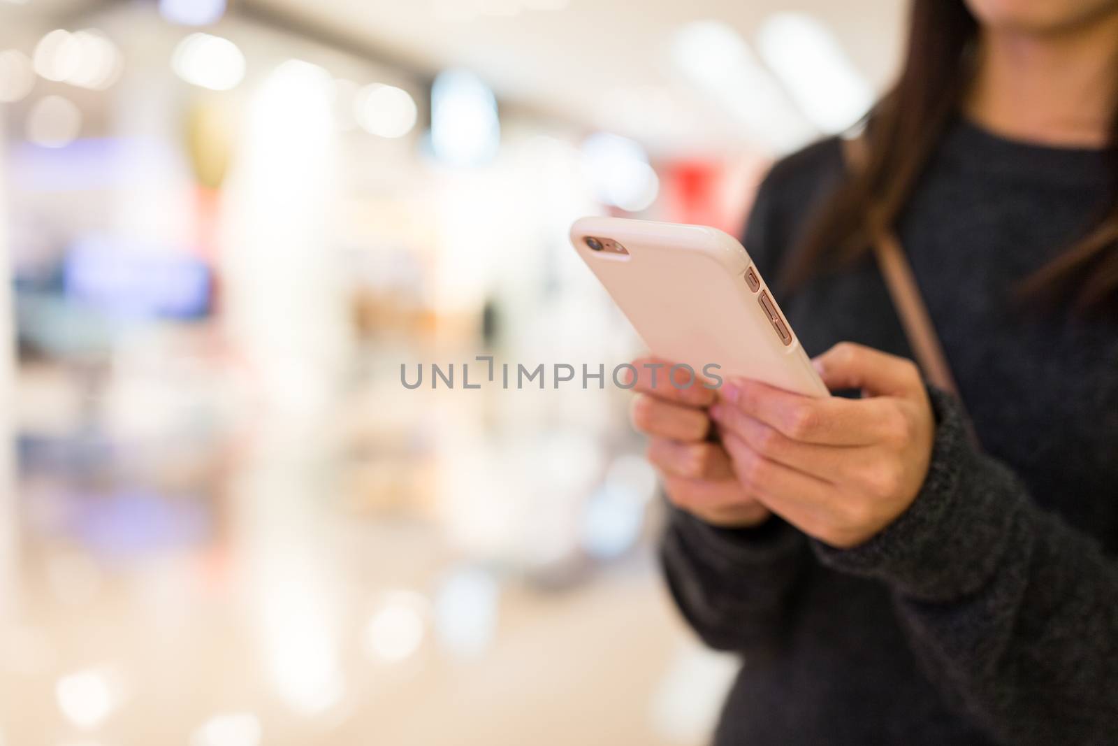 Woman working on cellphone