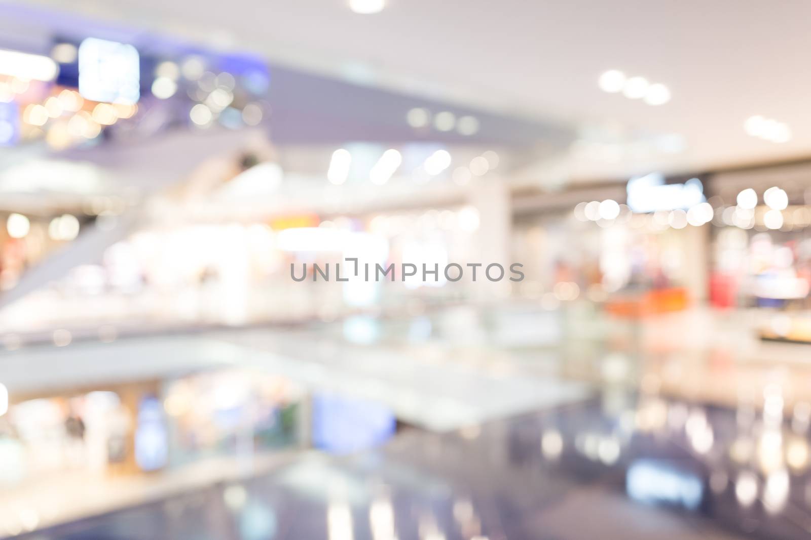 Abstract blur and bokeh beautiful luxury shopping mall by leungchopan