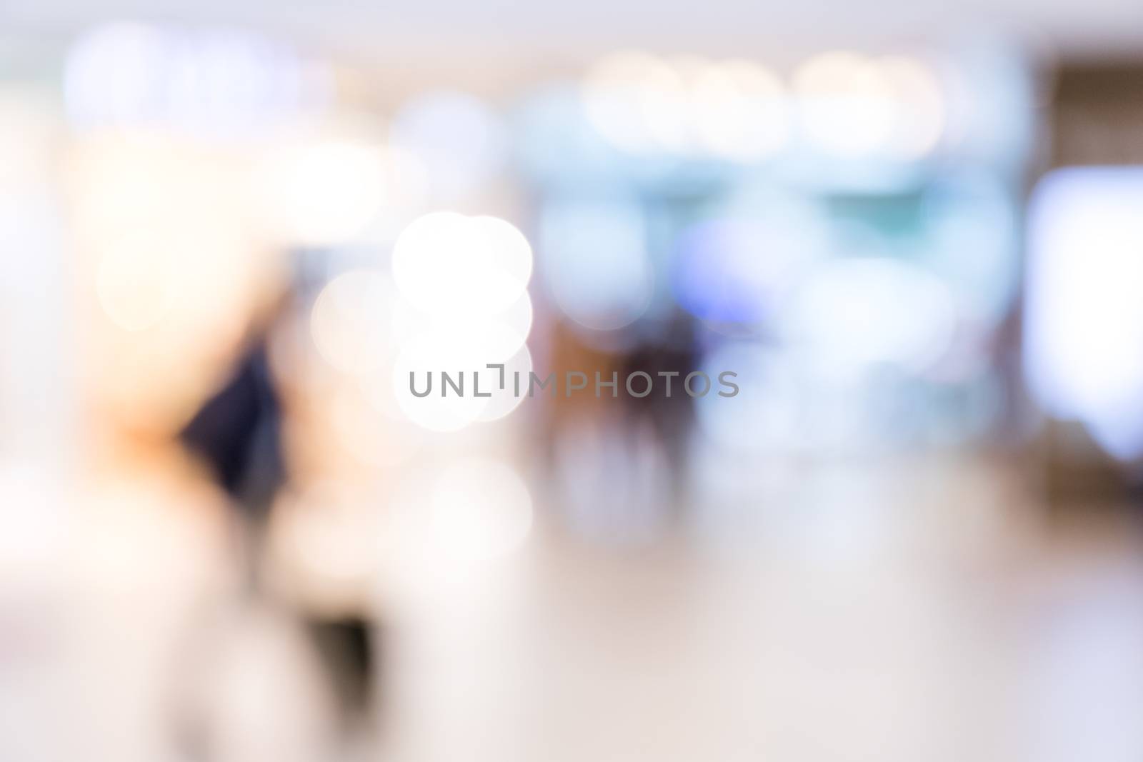 Blurry view of shopping mall by leungchopan