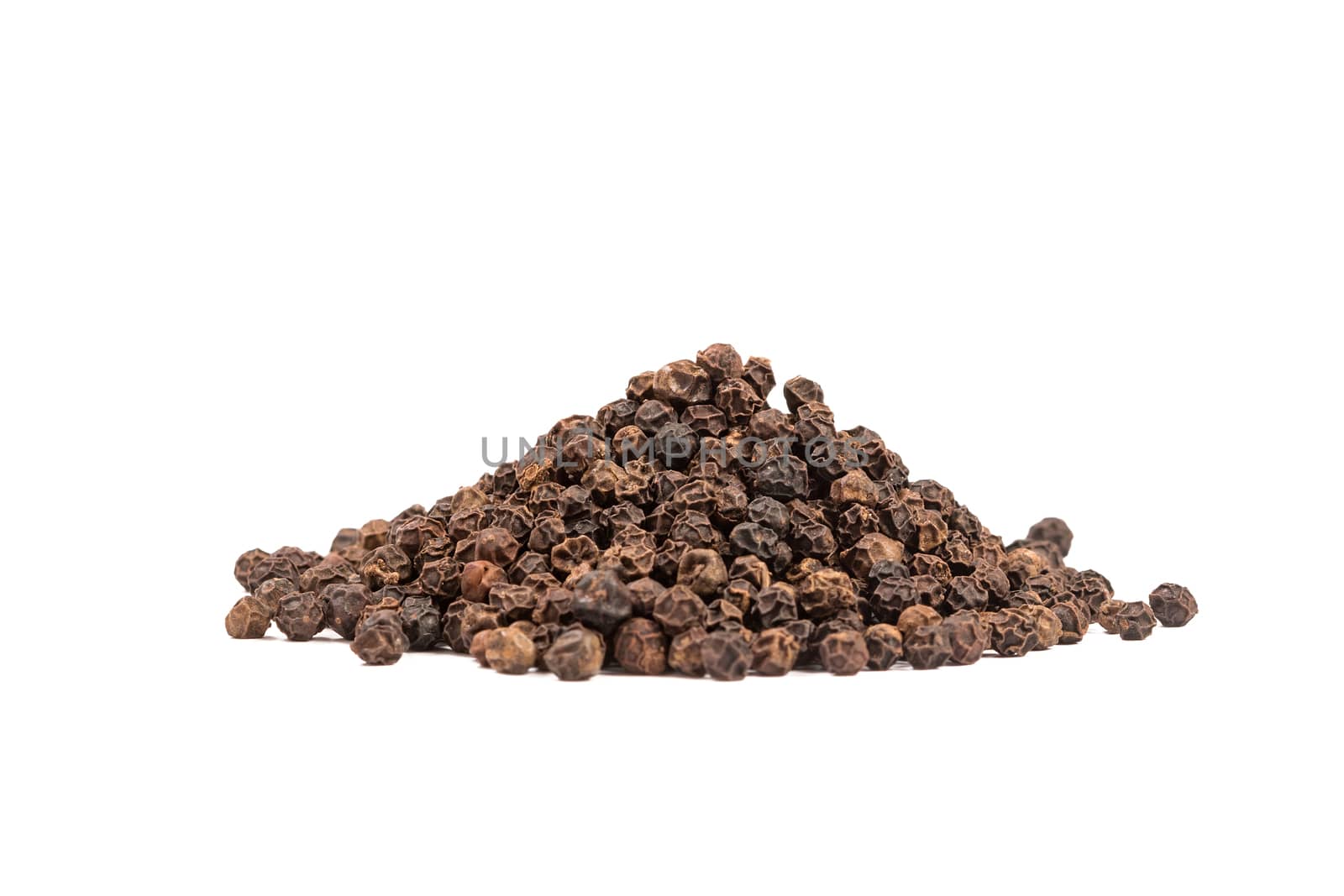 Pile of black whole pepper isolated on white background.