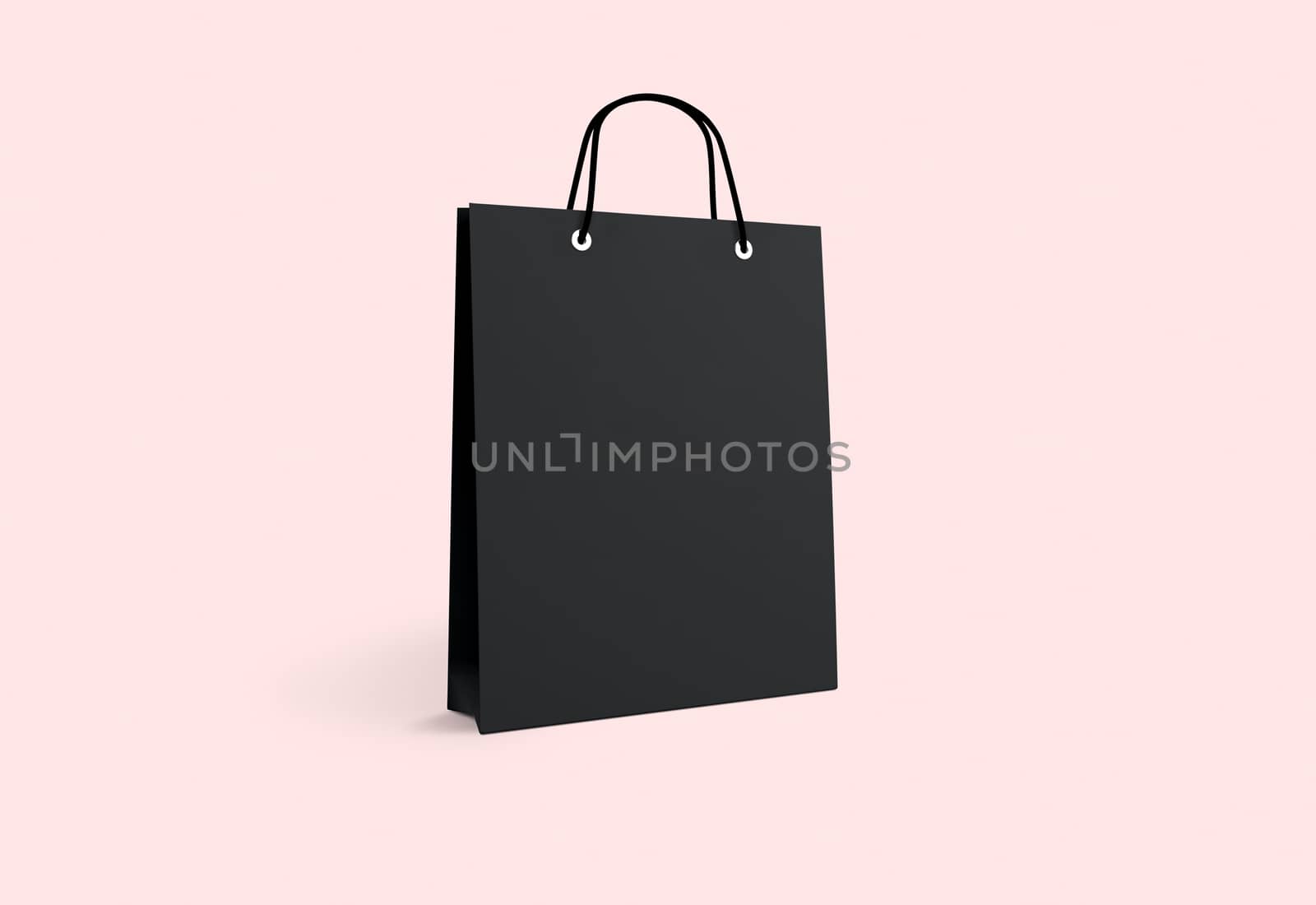 black paper bag for shopping on a pink background by boys1983@mail.ru