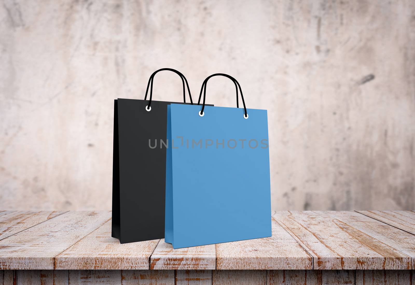 Two paper bags for shopping on a wooden background