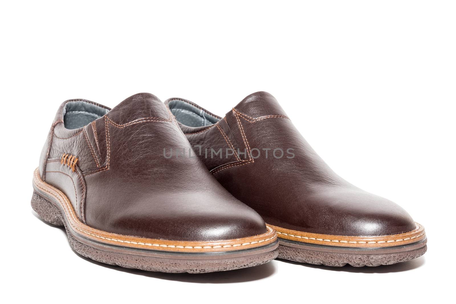 Brown men's shoes on white background, isolated, studio