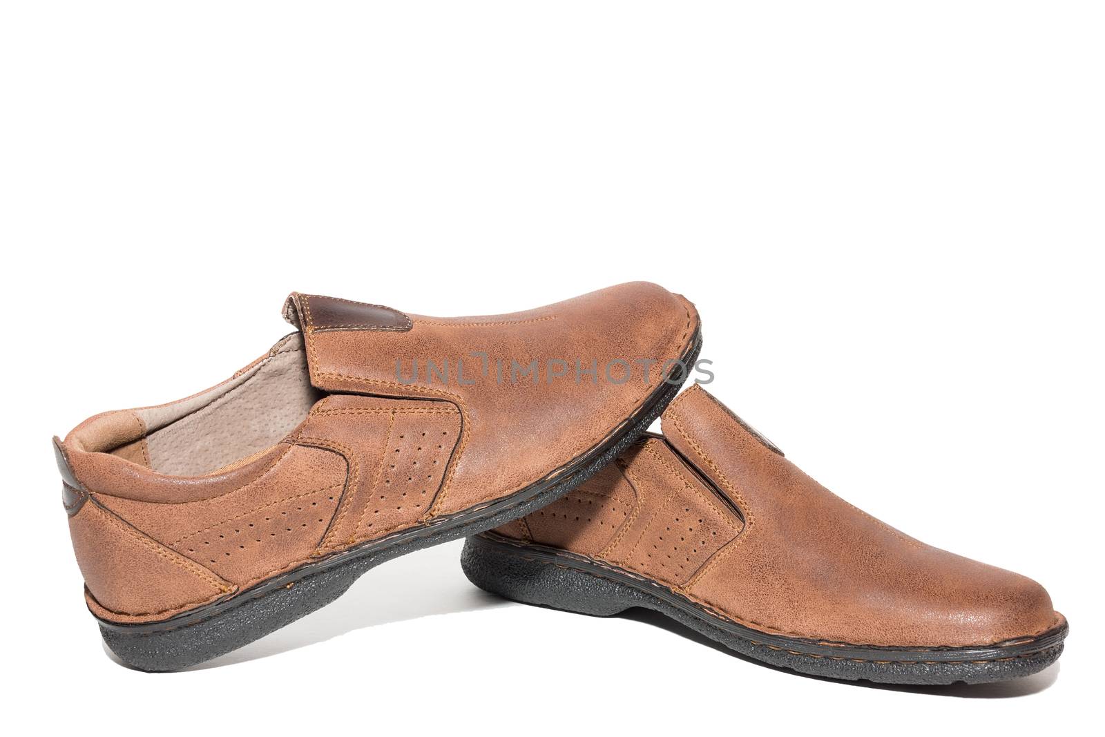 Brown men's shoes on white background, isolated, studio