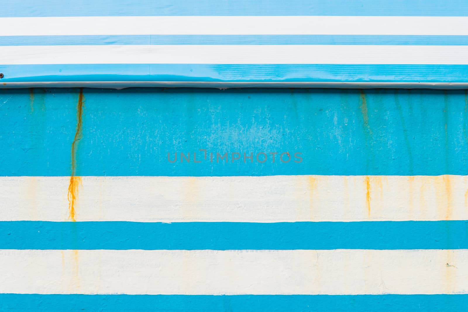 Blue alternating with white stripe for background.