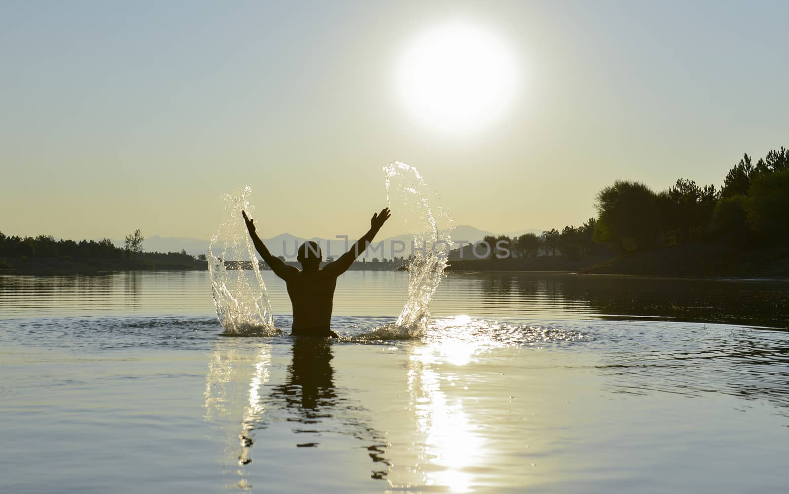 time of sunrise in cold water with energetic movements