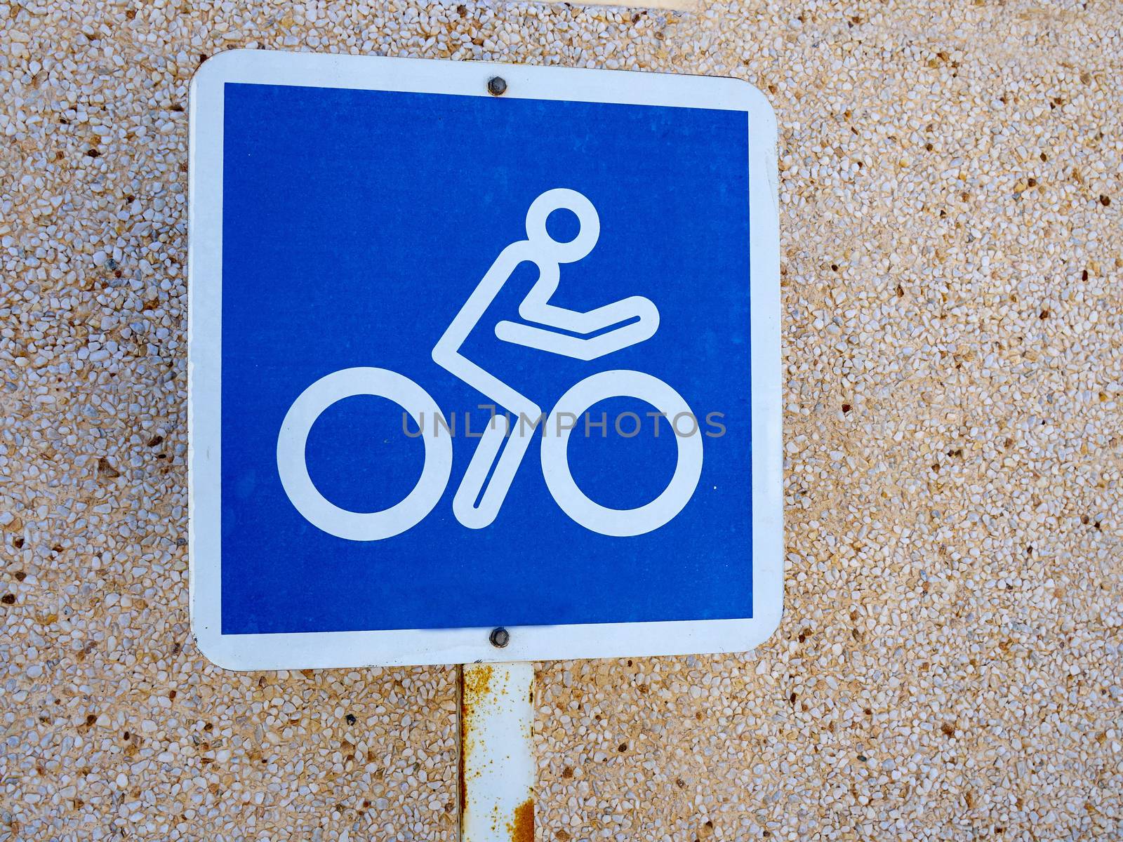 Bicycle lane blue and white sign by Ronyzmbow