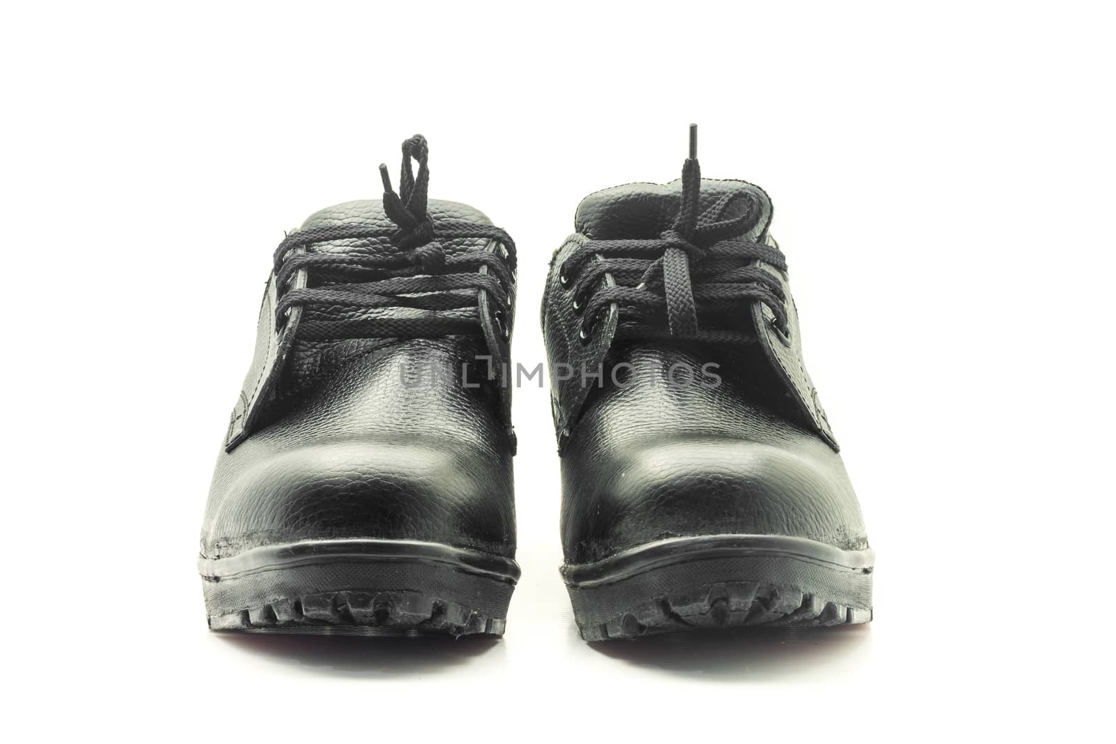 Protective workwear black safety shoes on white background.